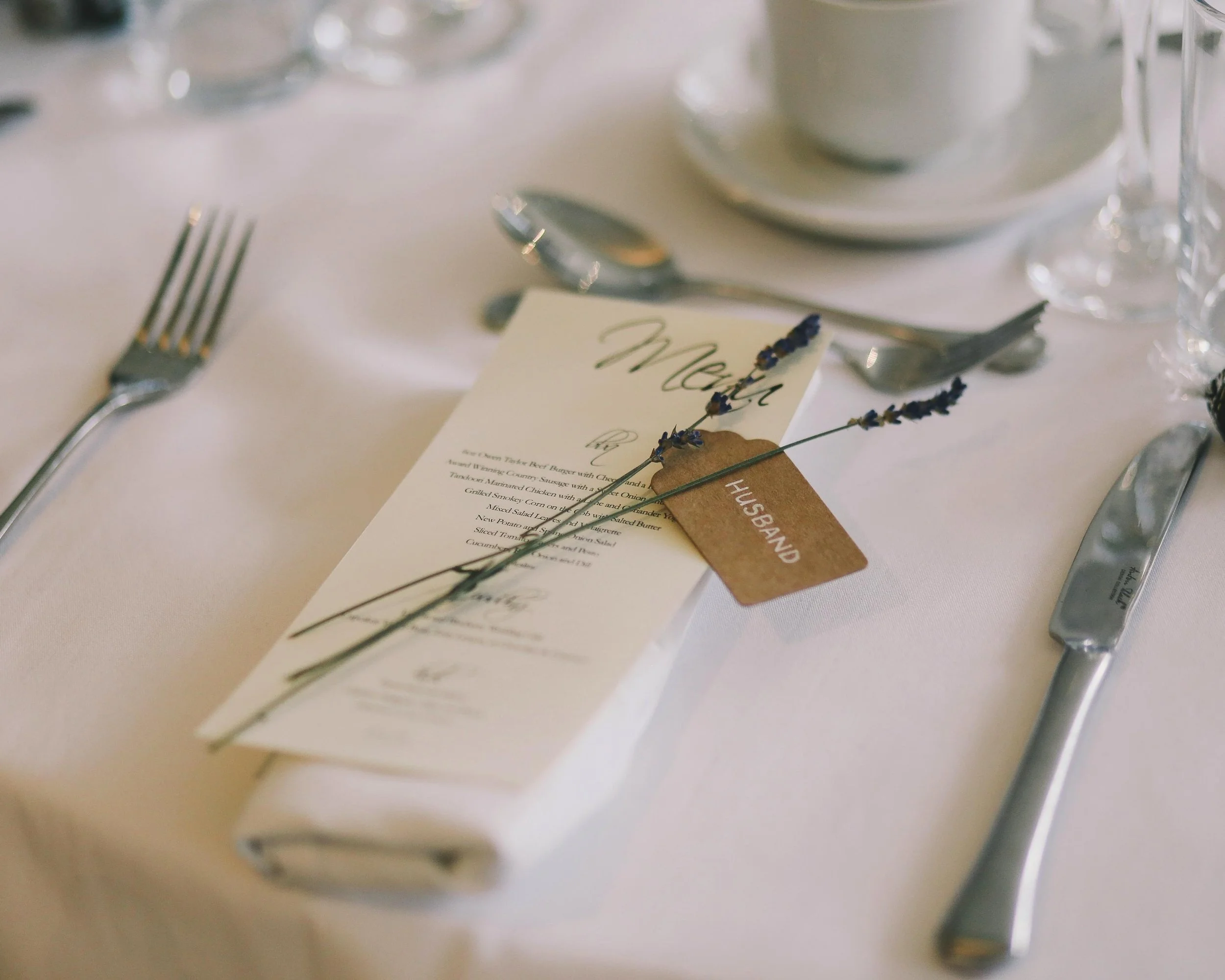 Refined wedding table setting with soft neutral tones and elegant minimal design — representing calm, organized wedding coordination by The Wedded Company.