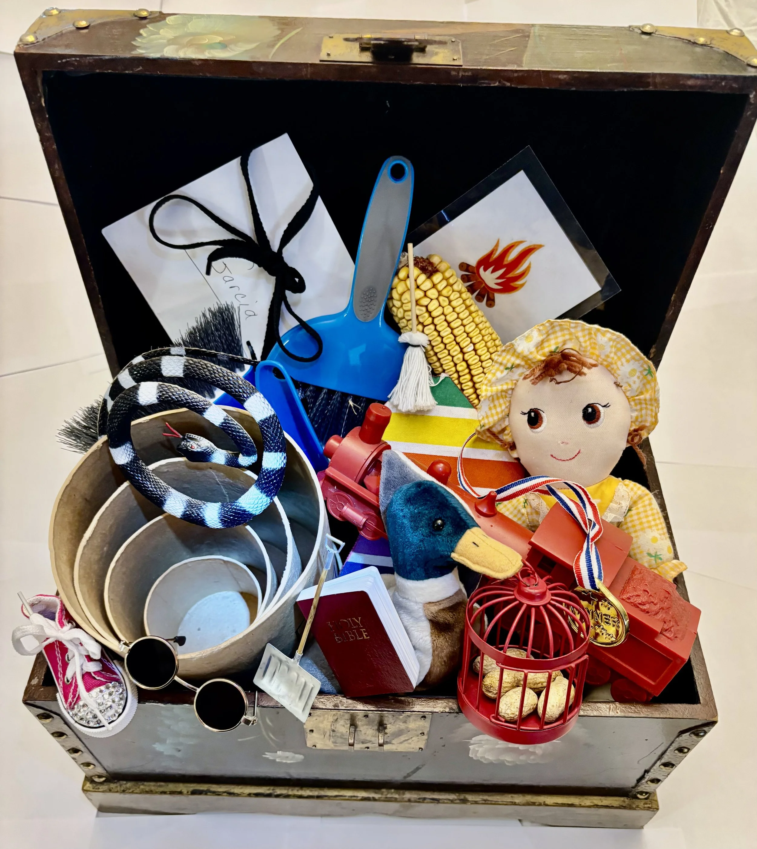 Jeanne's own character treasure chest, filled with trinkets from years of stories