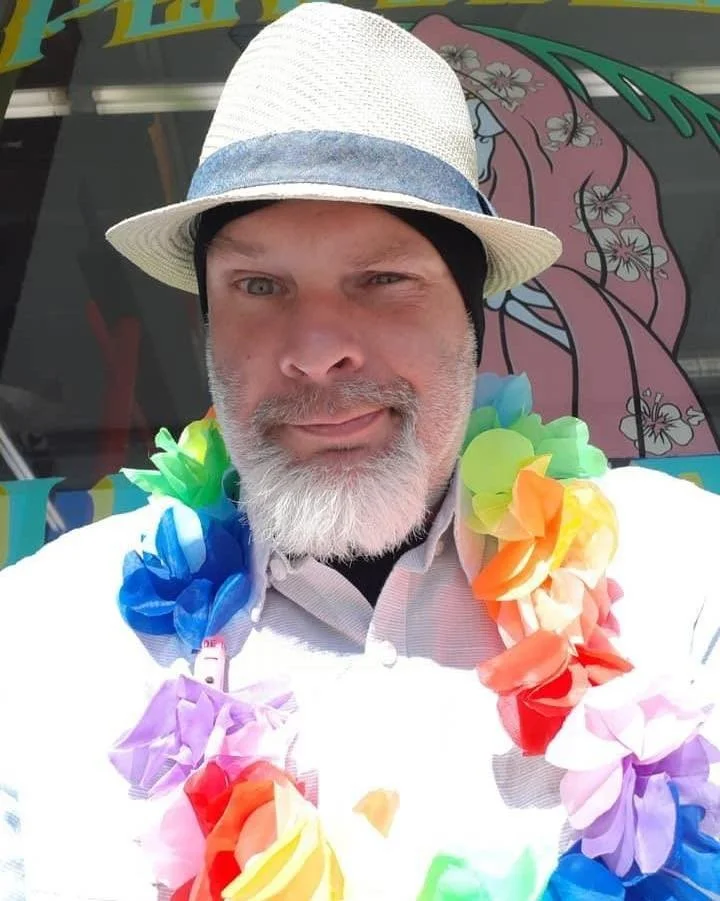 Portrait and lifestyle image of Travis Parmeley