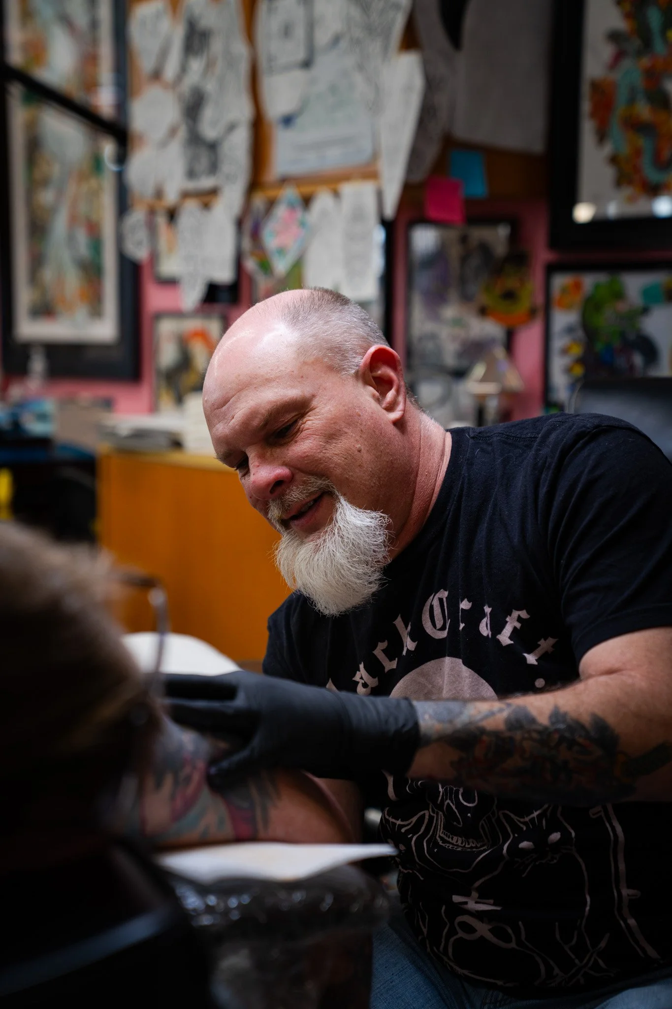 Lifestyle image related to Travis Parmeley's tattoo work