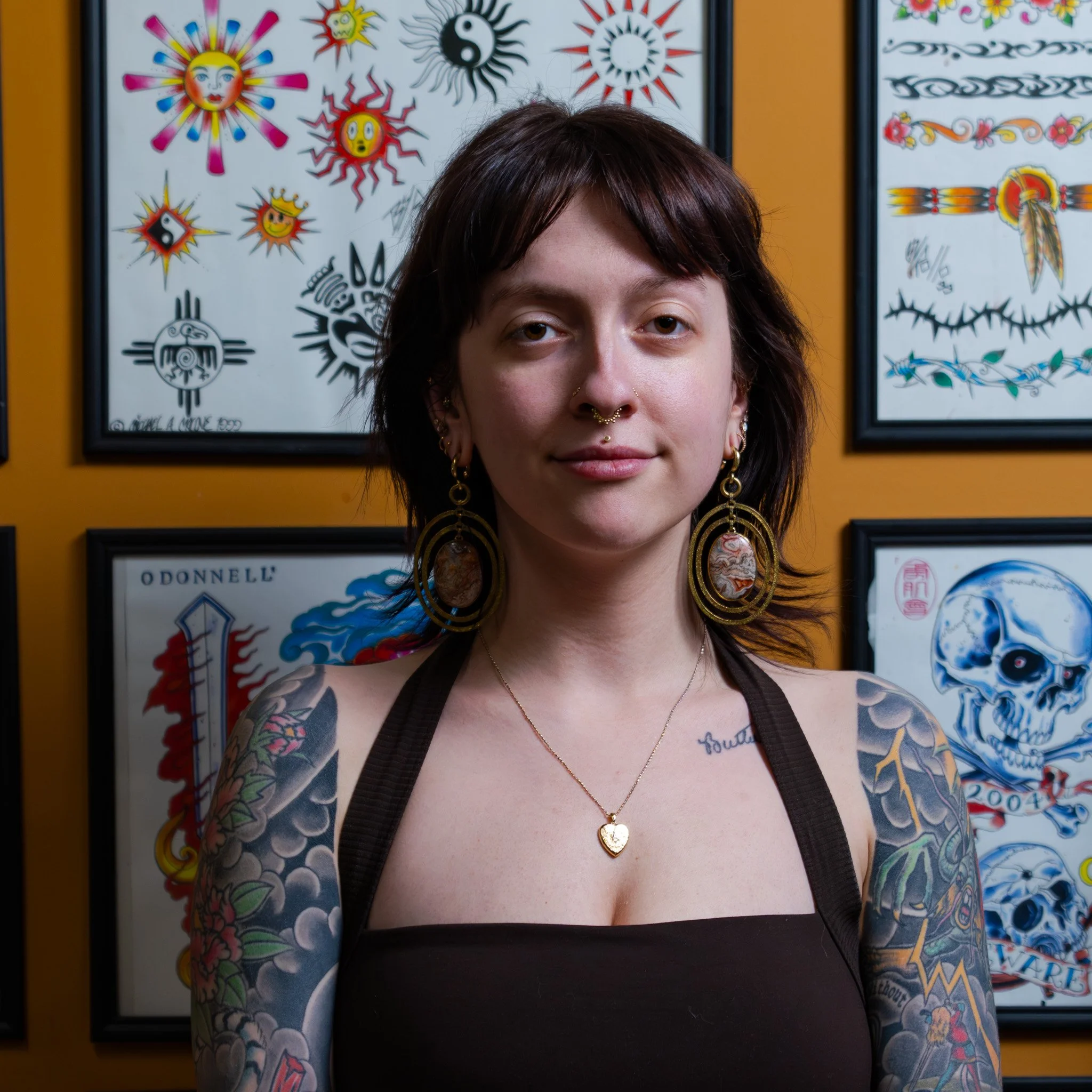 Lifestyle image related to Amia Cumbee's tattoo work