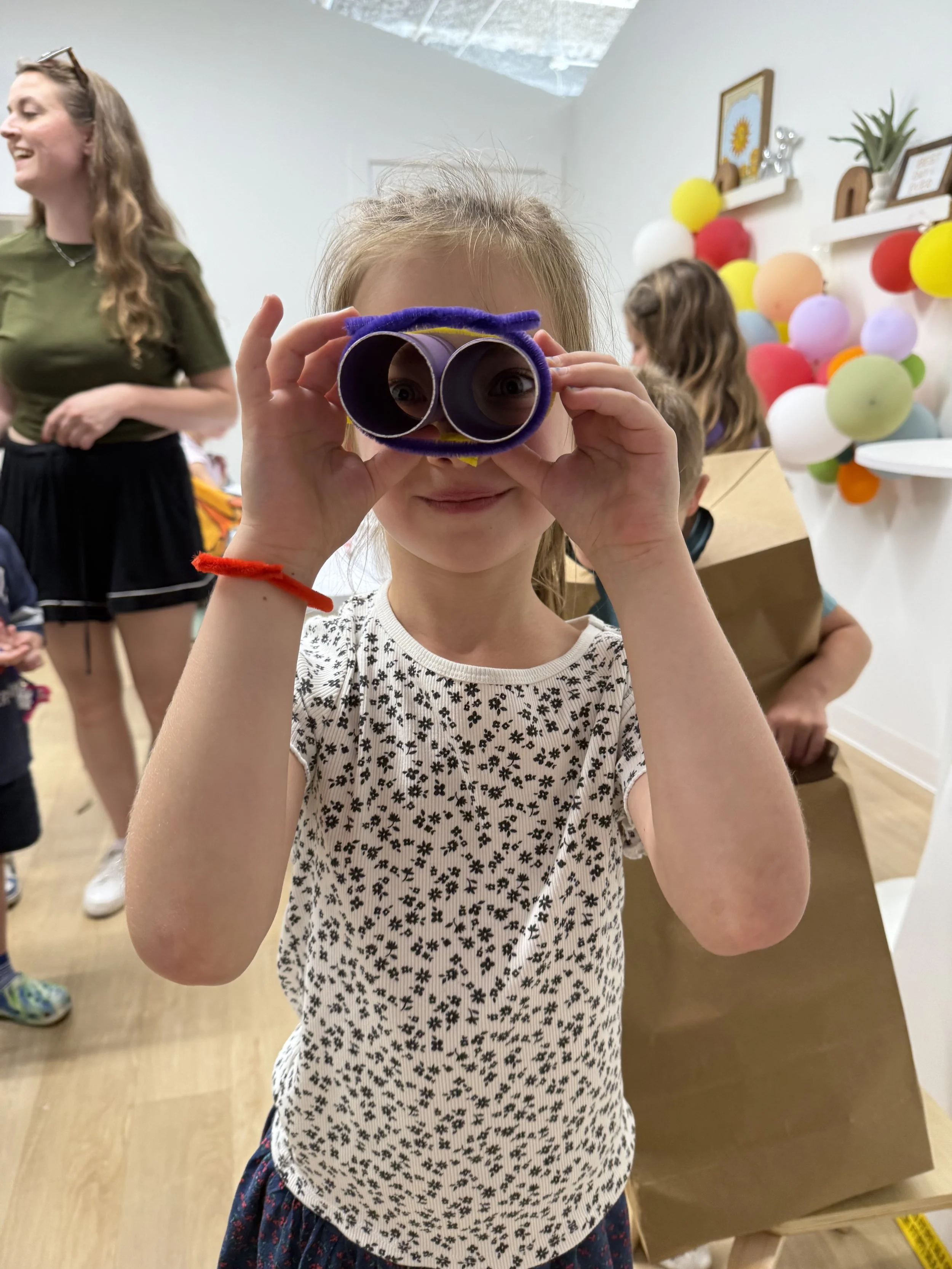 Child participating in a creative program at EAST Collective