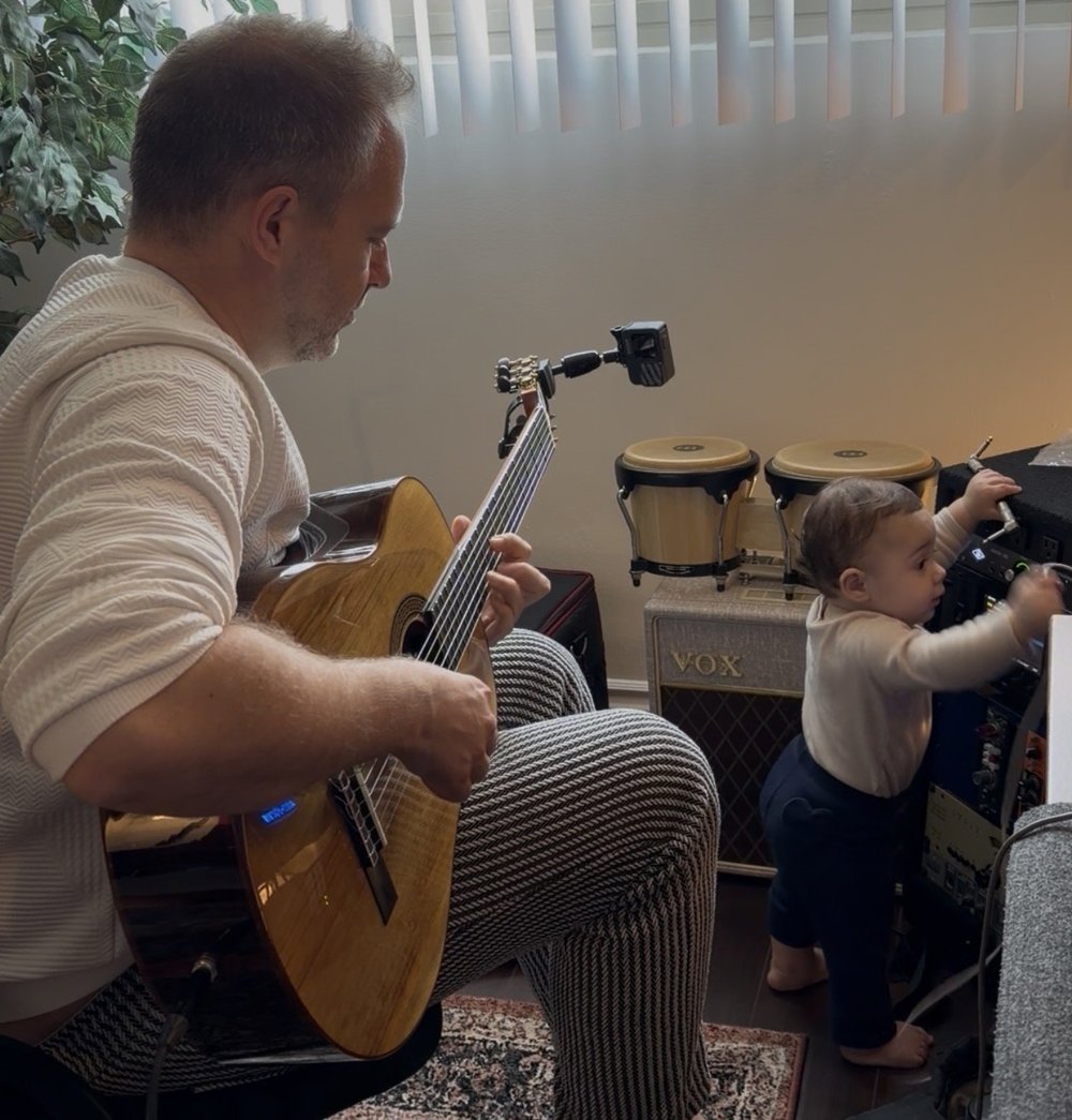 Markus Illko teaching guitar to a young child at Lost Note Guitar Academy in Mar Vista