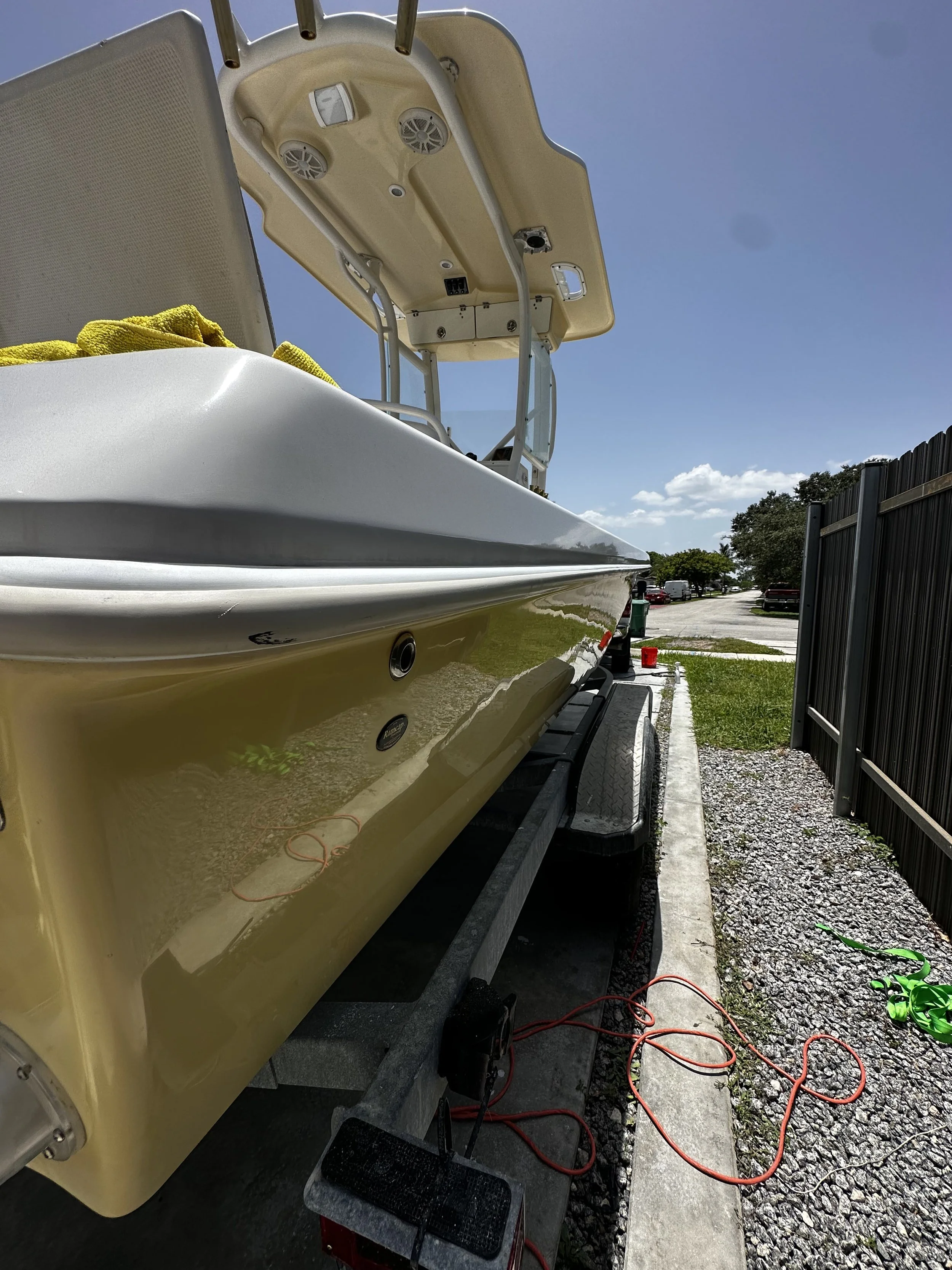 After boat detailing showing restored gloss and cleaner gelcoat