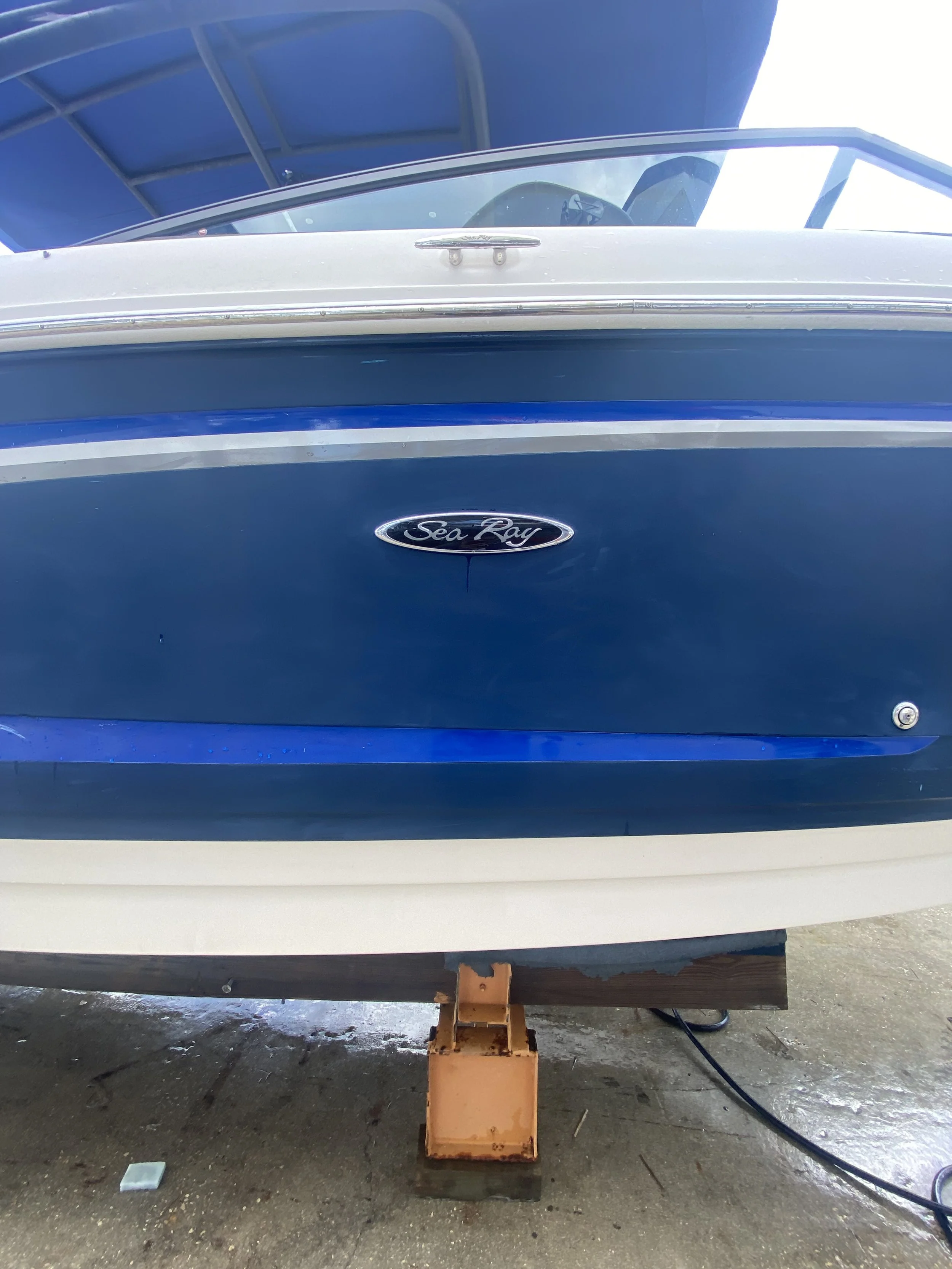 Before oxidation removal on boat gelcoat