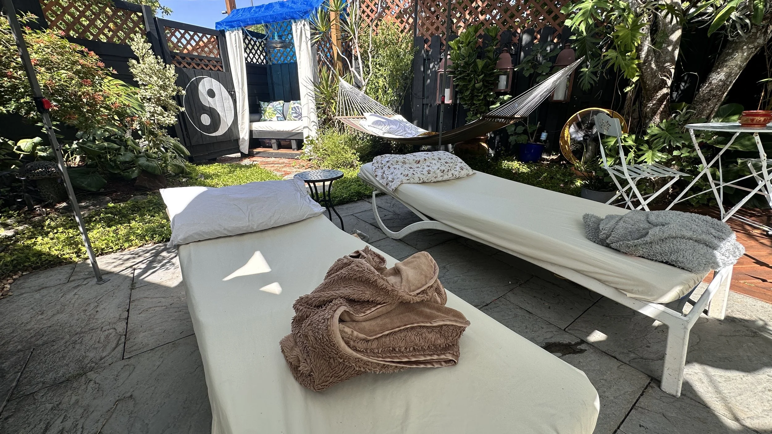 A quiet corner of the garden, set up for rest