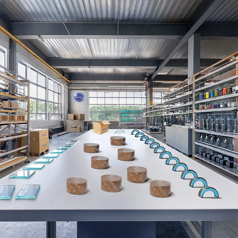 Custom award components arranged on a workshop table