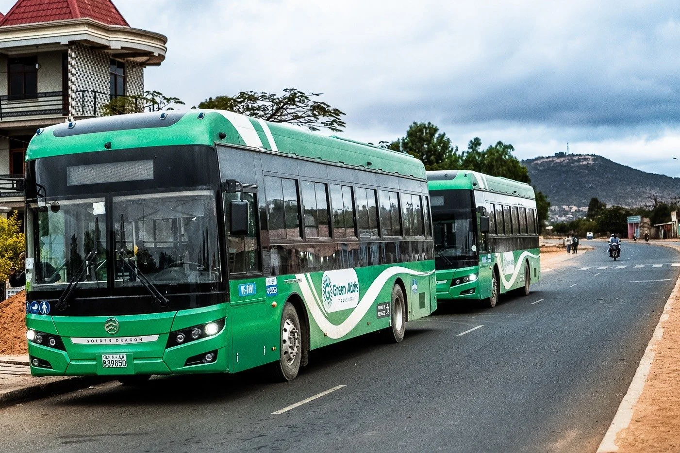 Electric buses travelling together