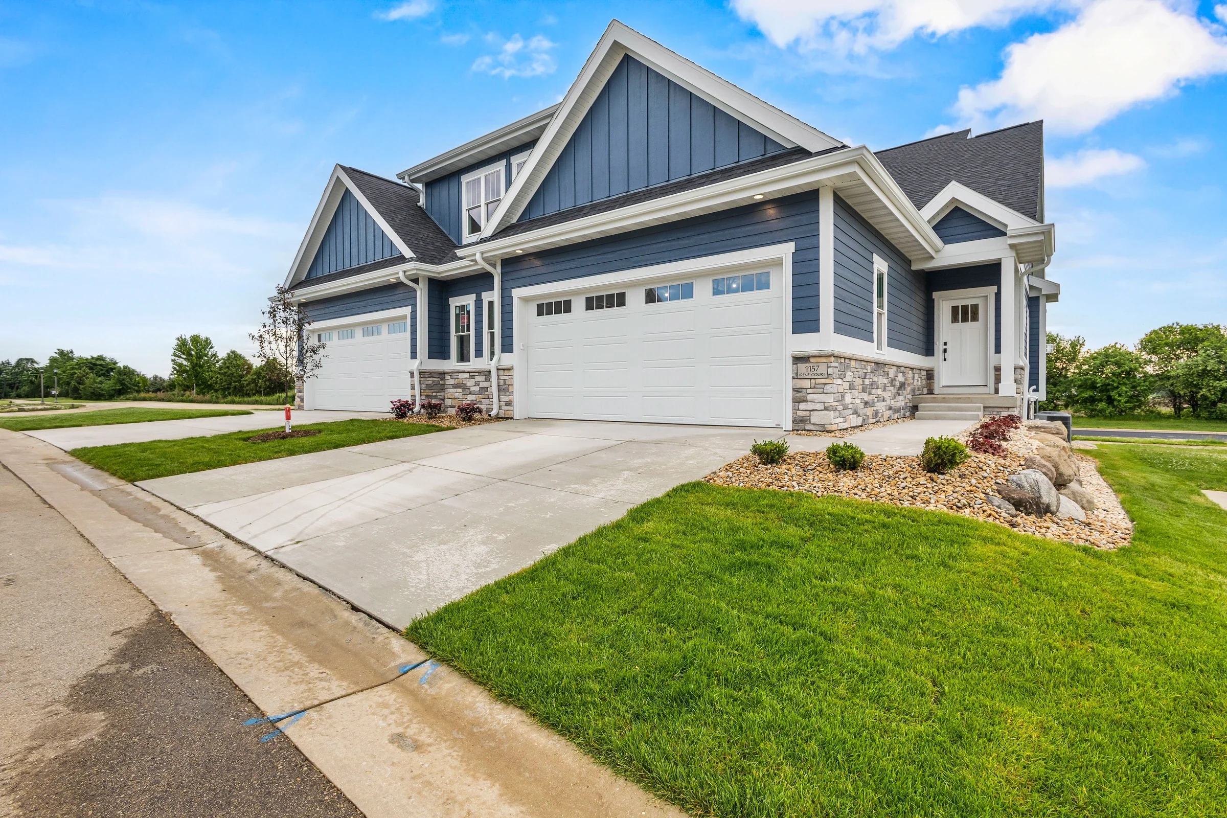 Irene Court — Garage driveway and landscaped side approach
