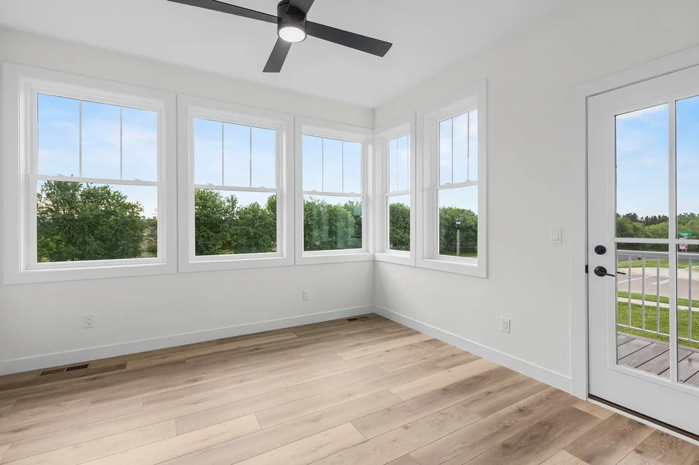 Irene Court — Four-season sunroom with windows on three sides