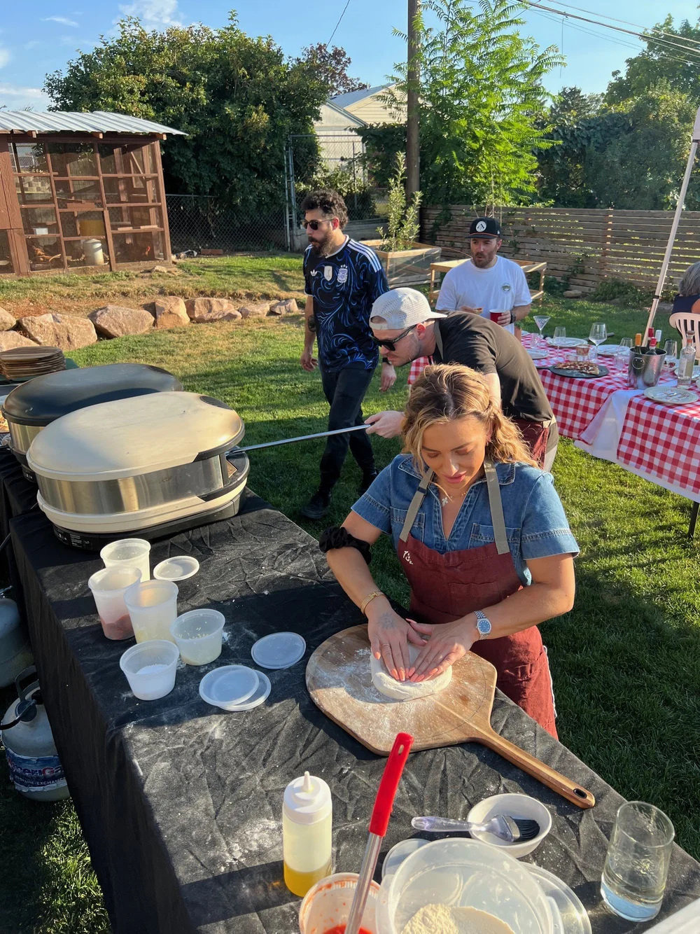 Kids making pizzas at a birthday party