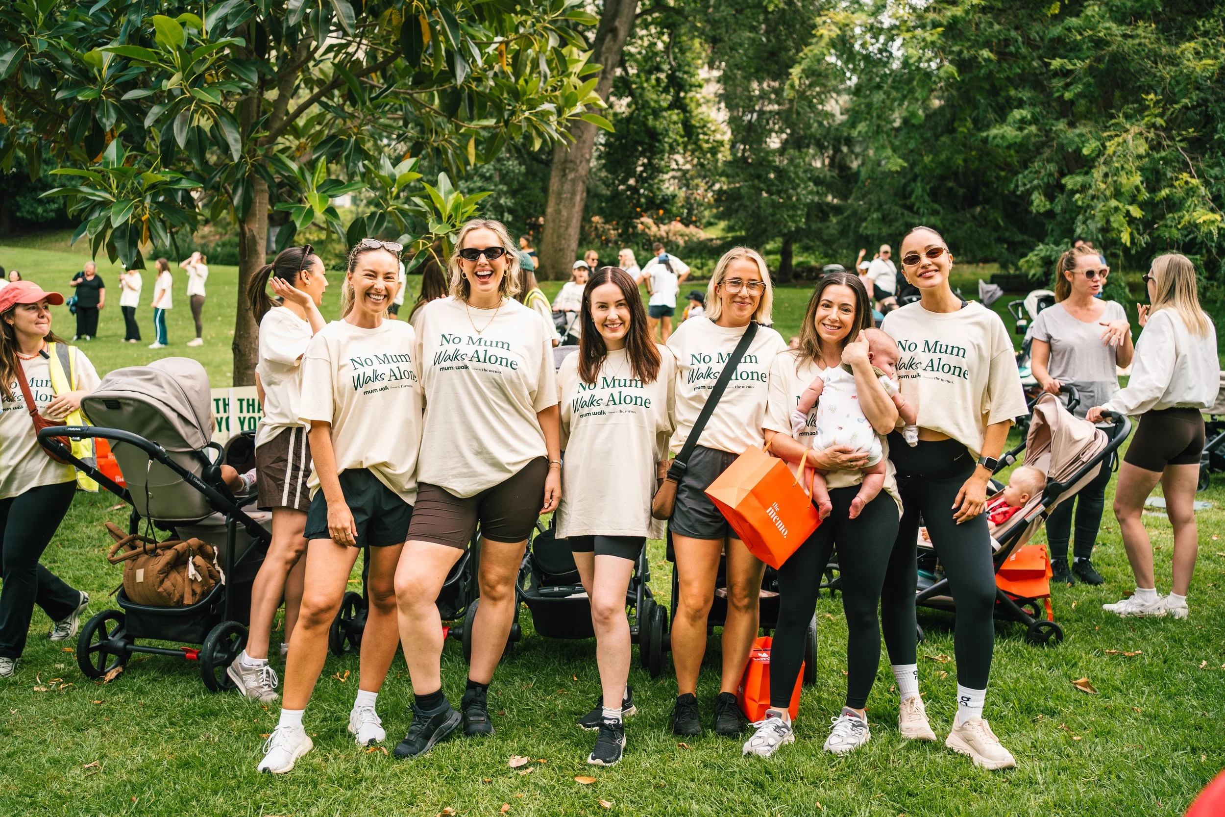 Mums in No Mum Walks Alone tees with The Memo gift bags at a Mum Walk