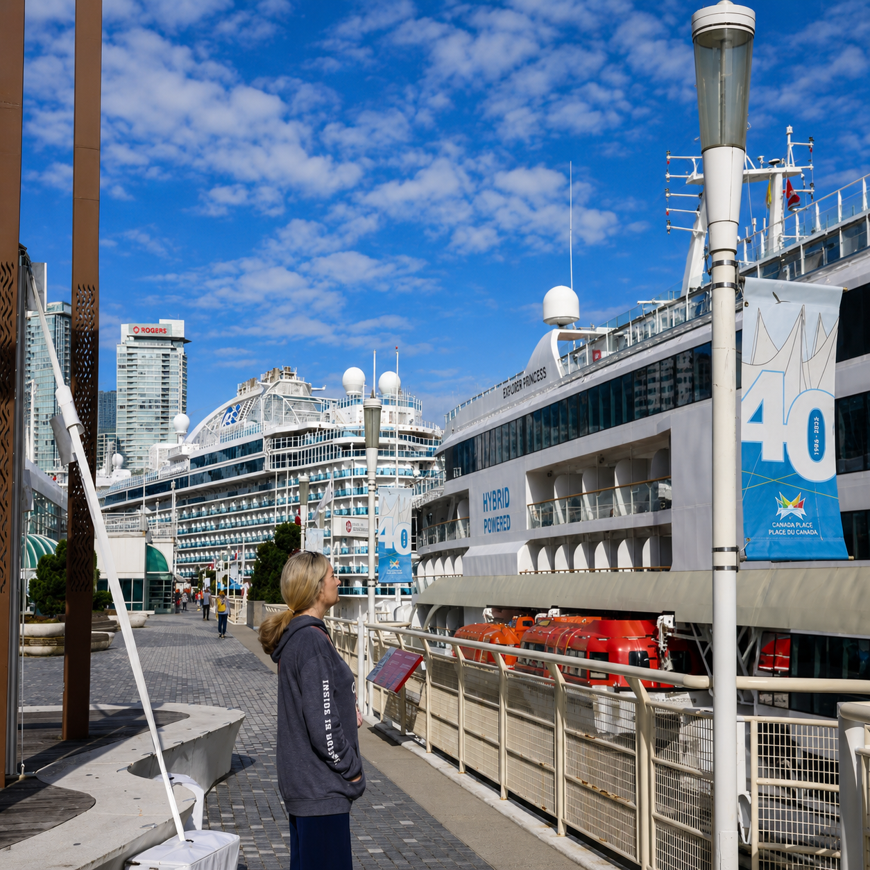 April looking up at HX Expeditions MS Roald Amundsen before boarding in Vancouver