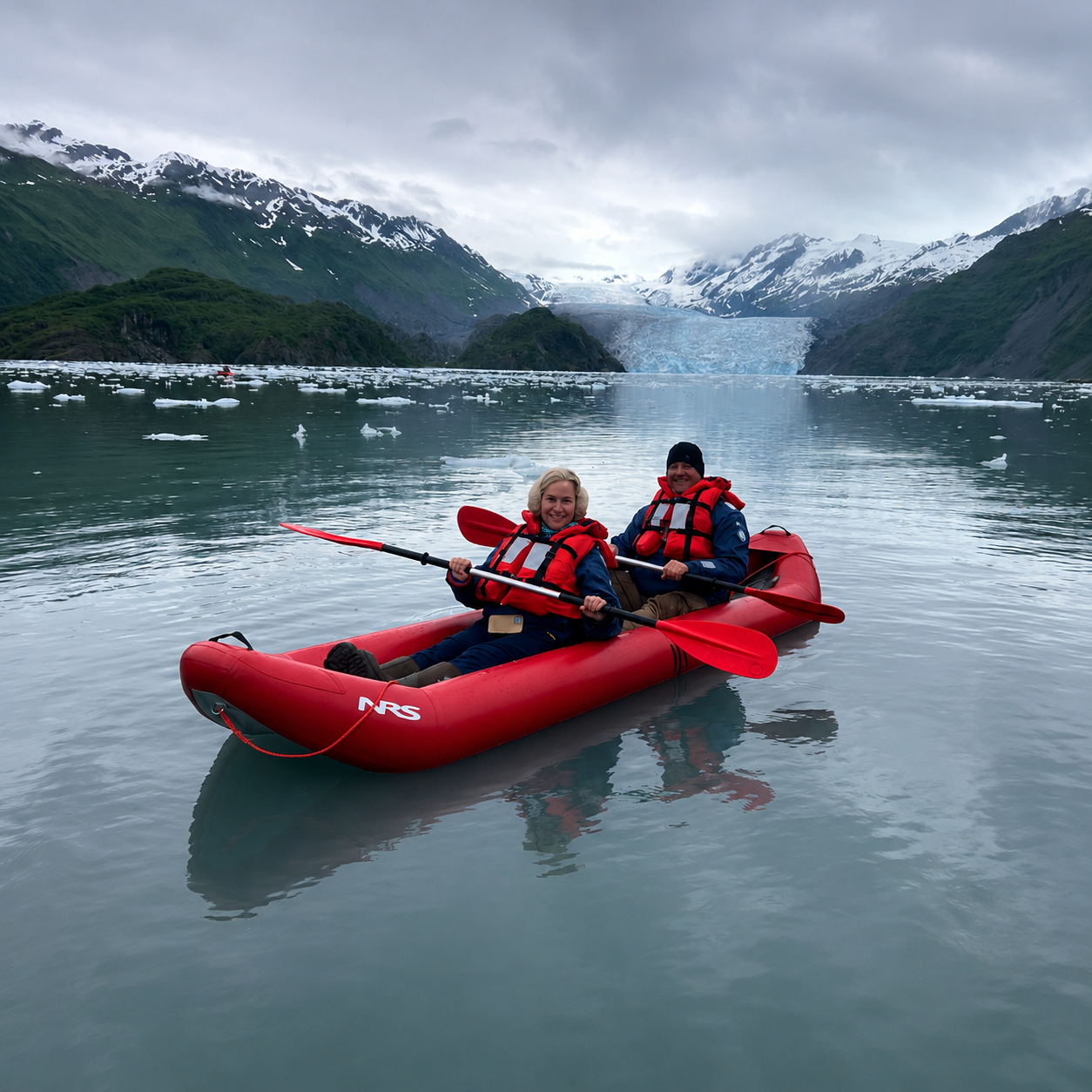 April and Donald kayaking in College Fjord Alaska