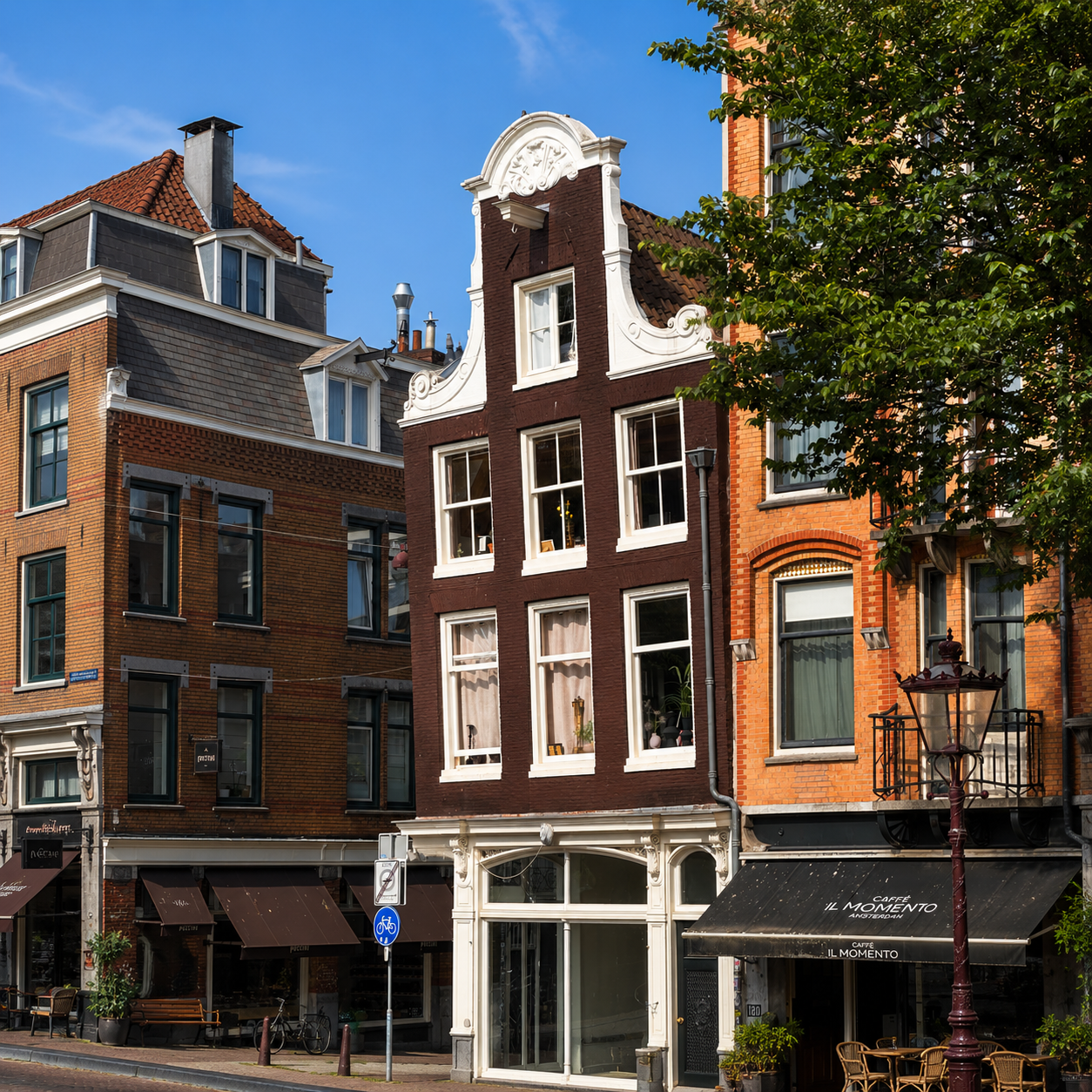 Narrow historic canal house architecture in Amsterdam