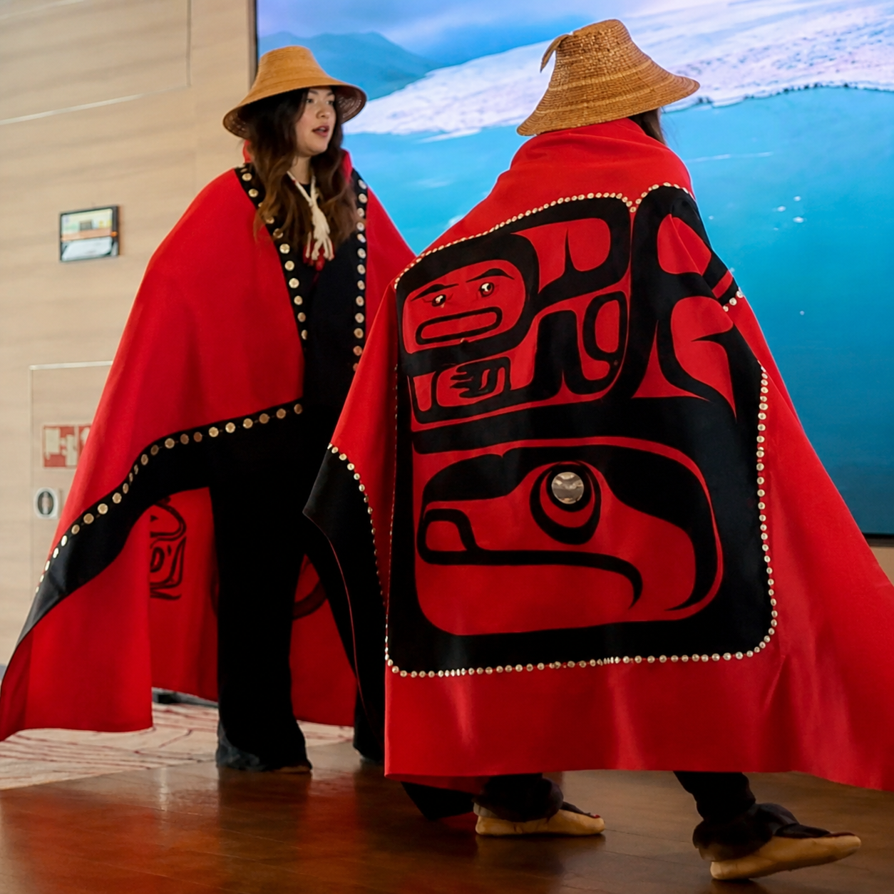 Kake community dancers performing traditional regalia aboard HX Expeditions