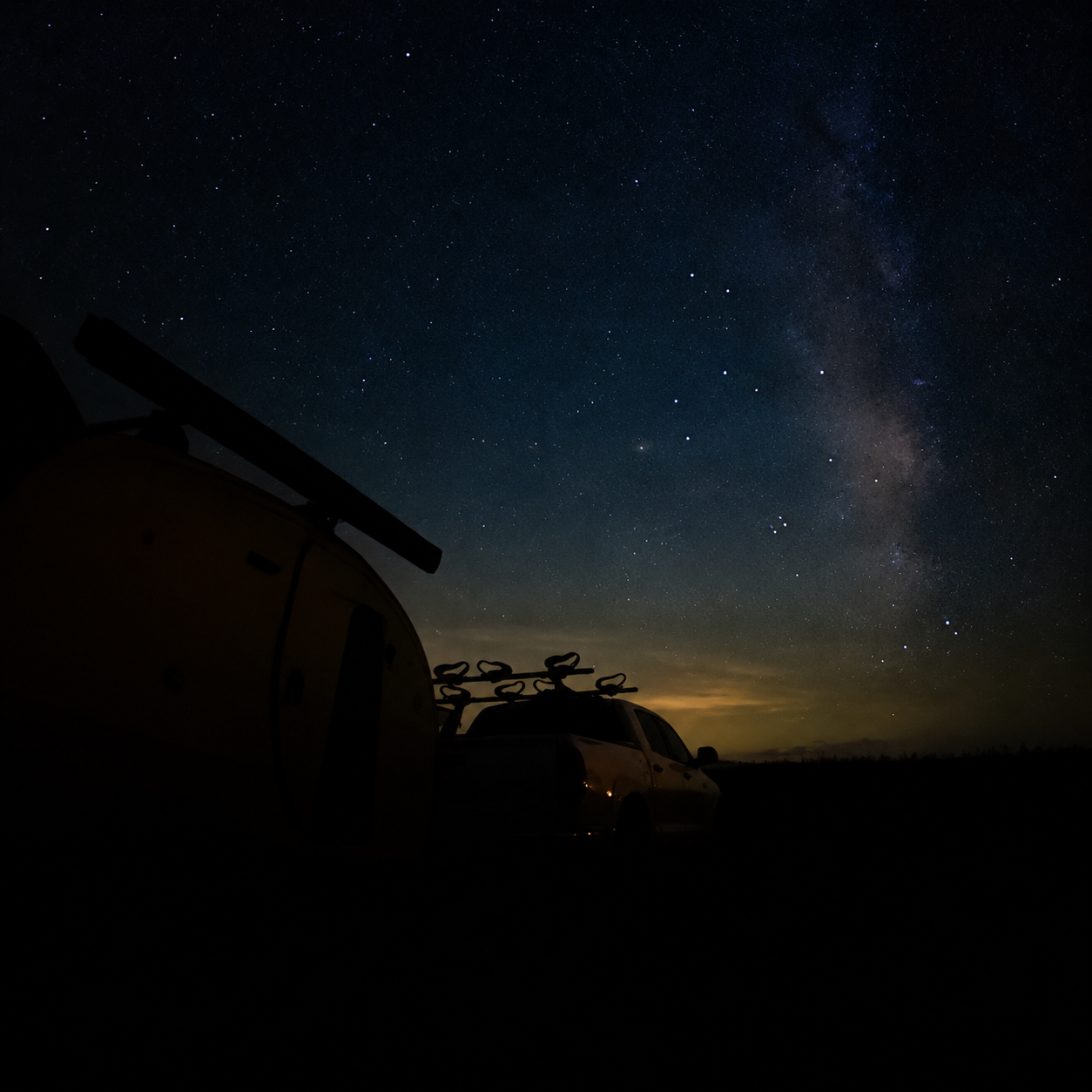 The Milky Way and a starry night sky over the overland campsite at Spruce Knob Mountain Center, West Virginia