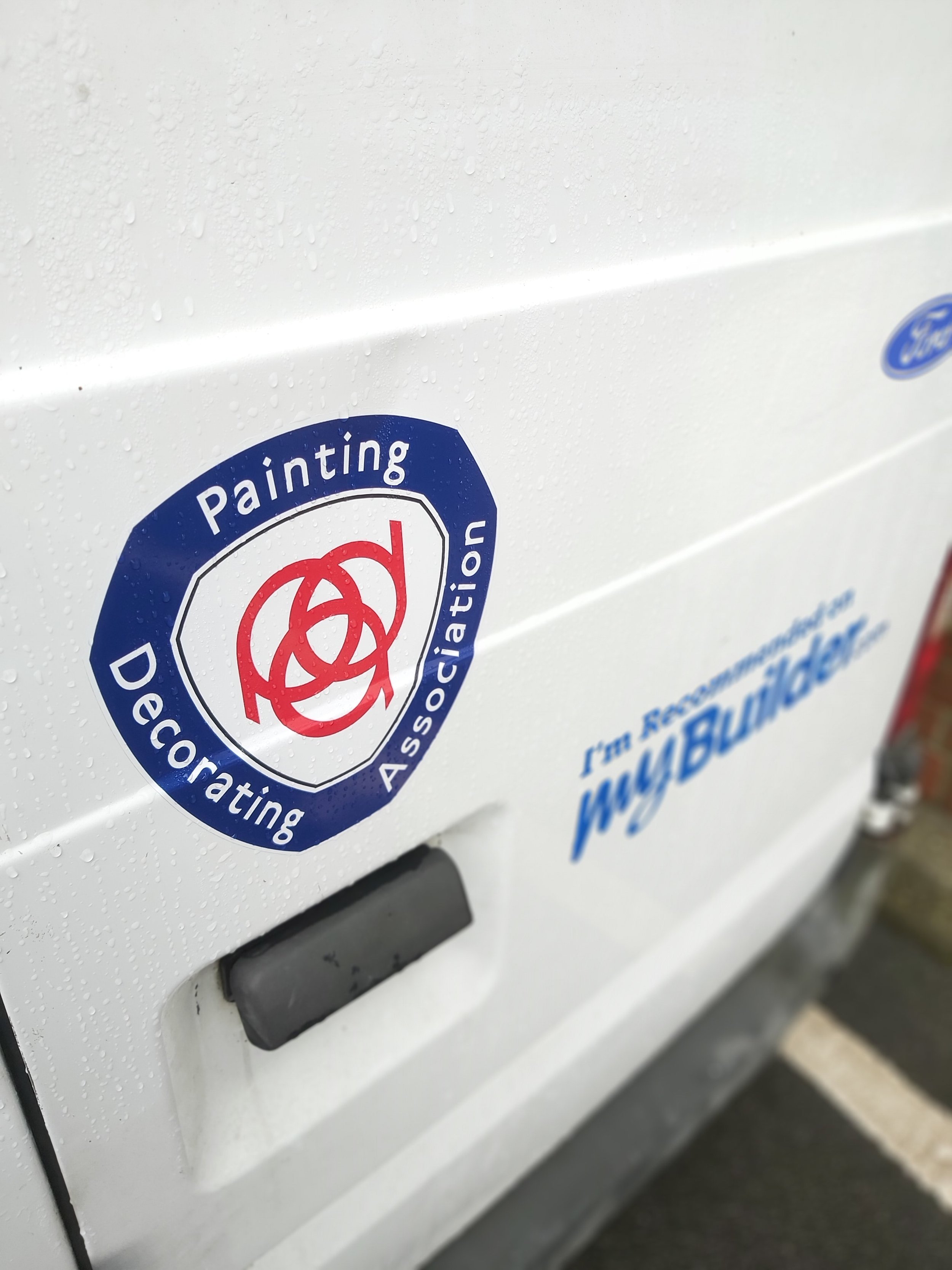PDA sticker on the UIL van, next to the MyBuilder recommendation decal