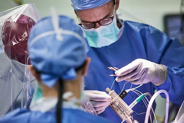 Dr. Richardson connecting the microelectrodes.