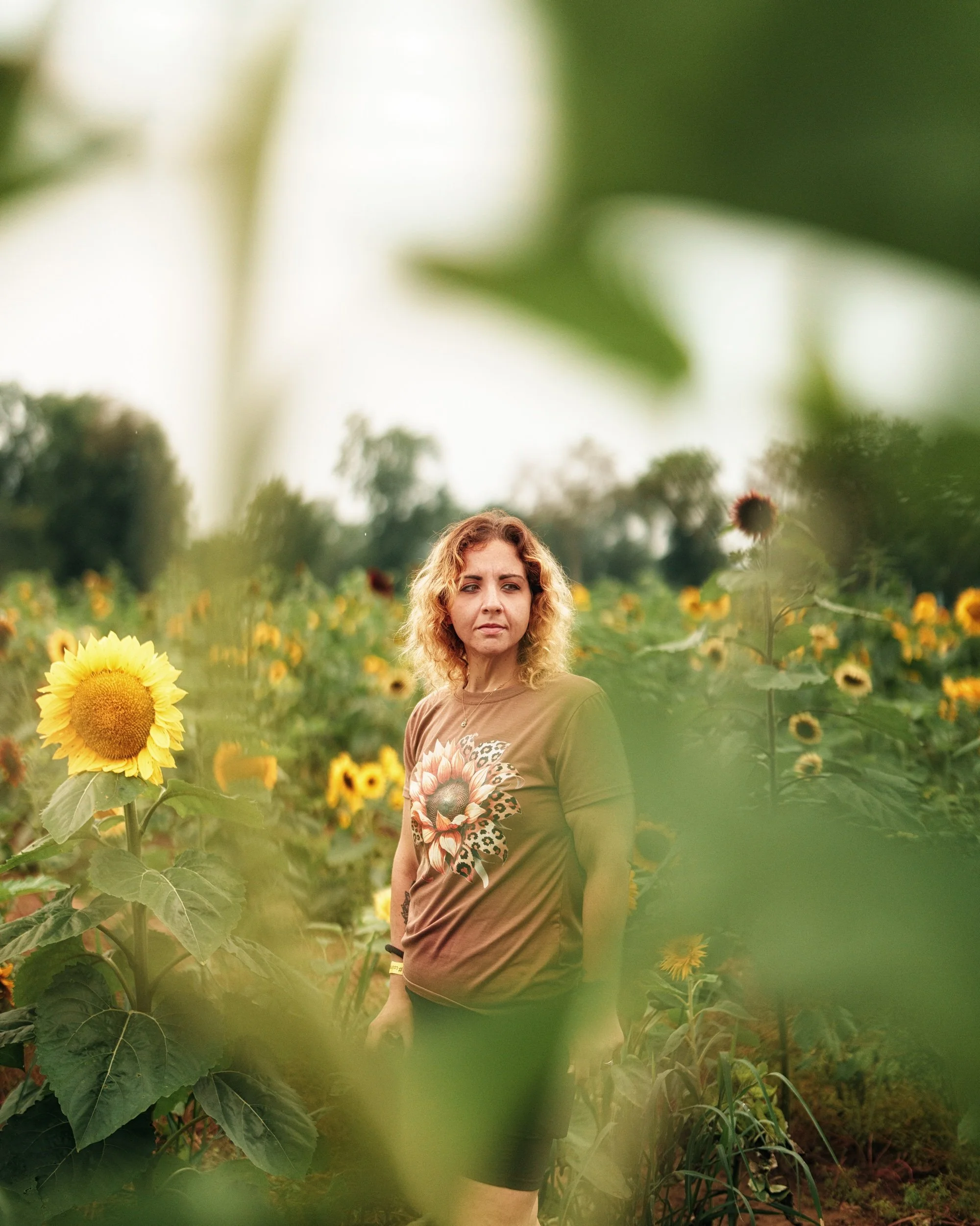 Portrait in a sunflower field