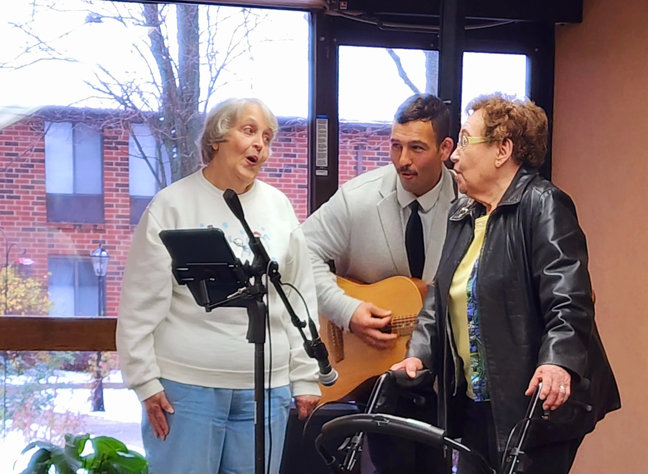 Residents singing with live music performer