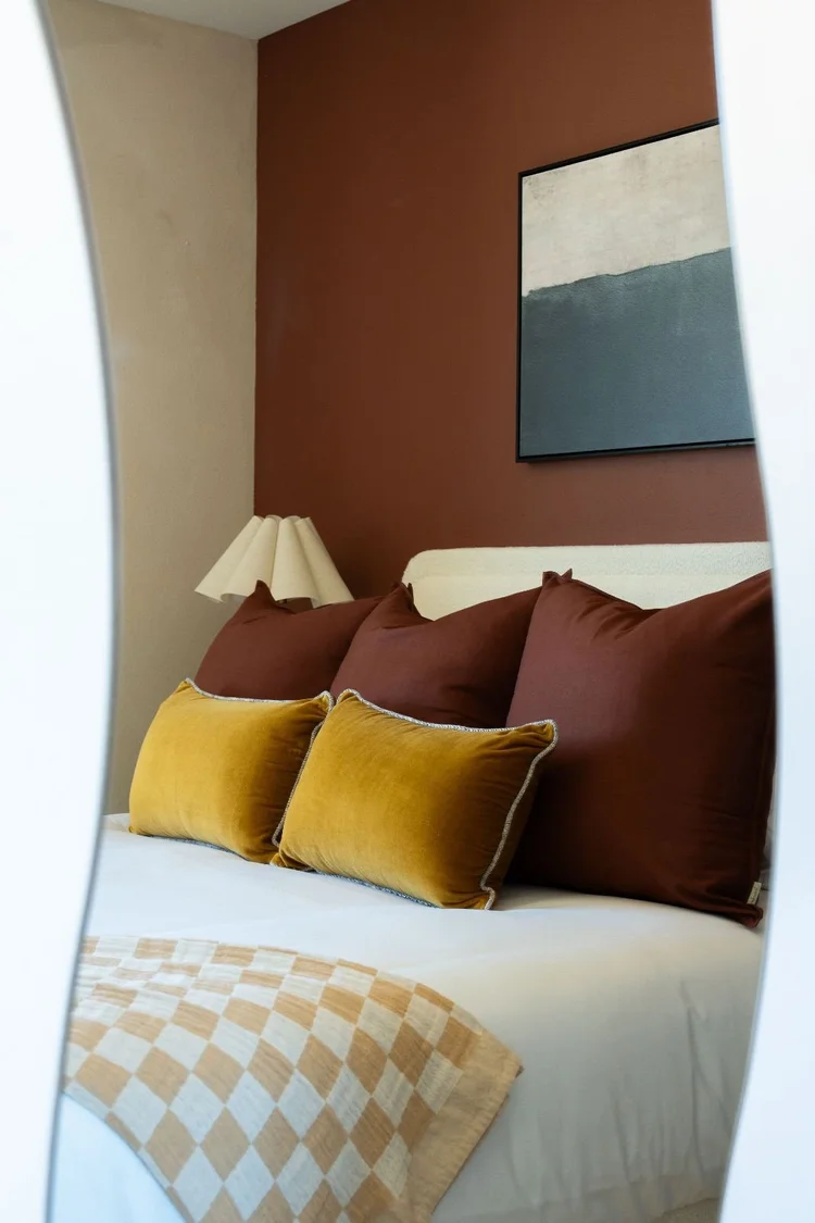 Wavy mirror reflecting the Mojave Room closet
