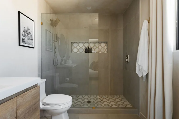 Ensuite walk-in shower with brass fixtures