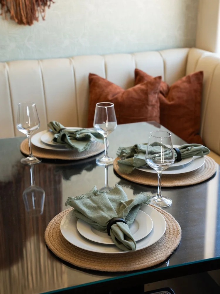 Table set for two at the dining banquette