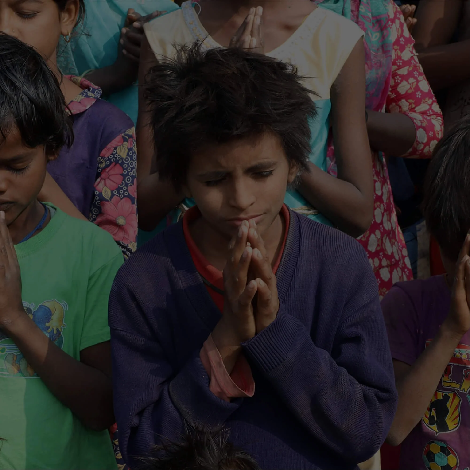 Student holding bible in class