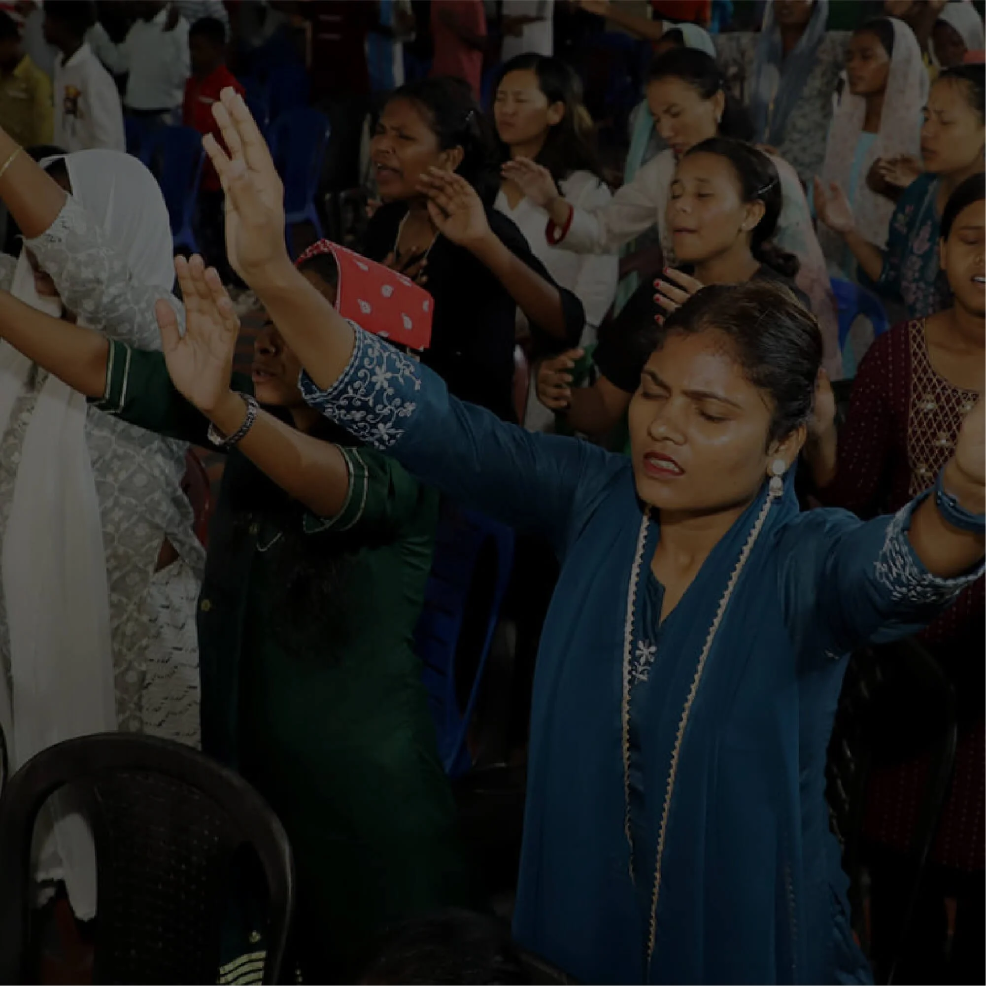 Student holding bible in class