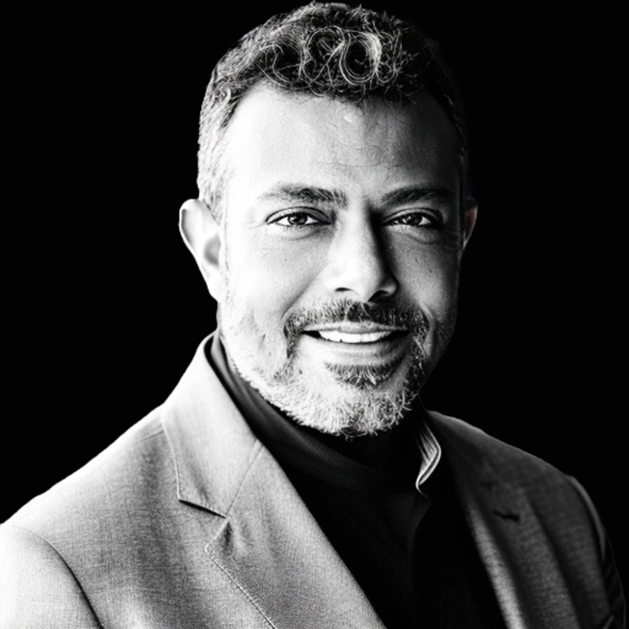 Black-and-white portrait of author Neil Banerjee