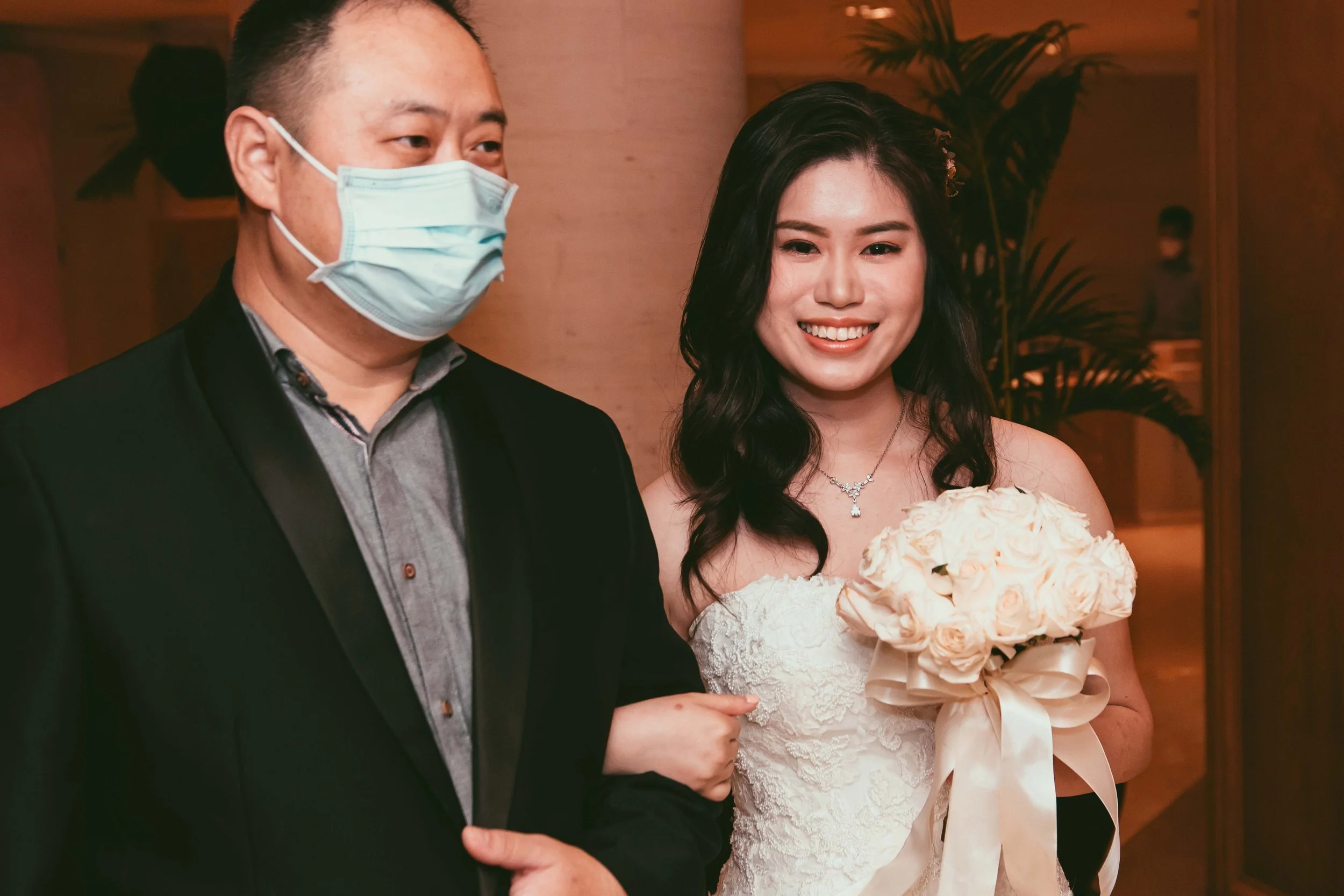 Darren and JX sharing a moment during their actual day wedding in Singapore