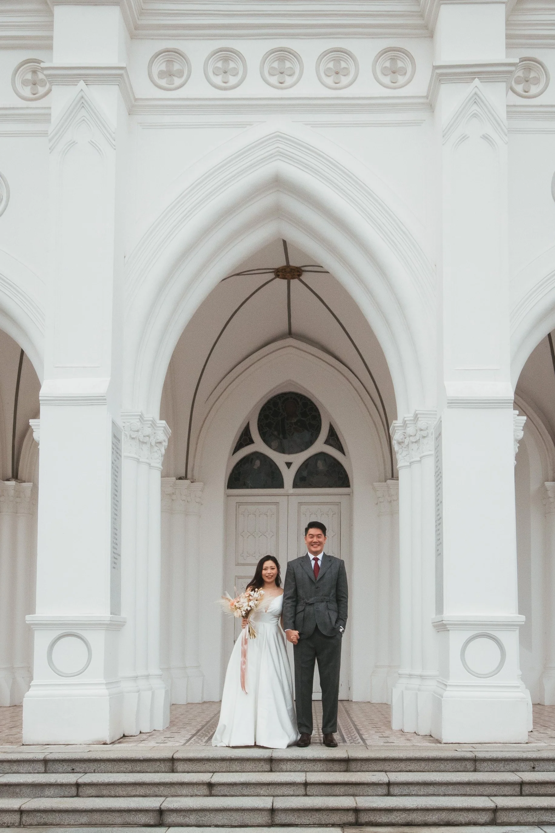 Brandon and Mindy during their actual day wedding at CHIJMES in Singapore