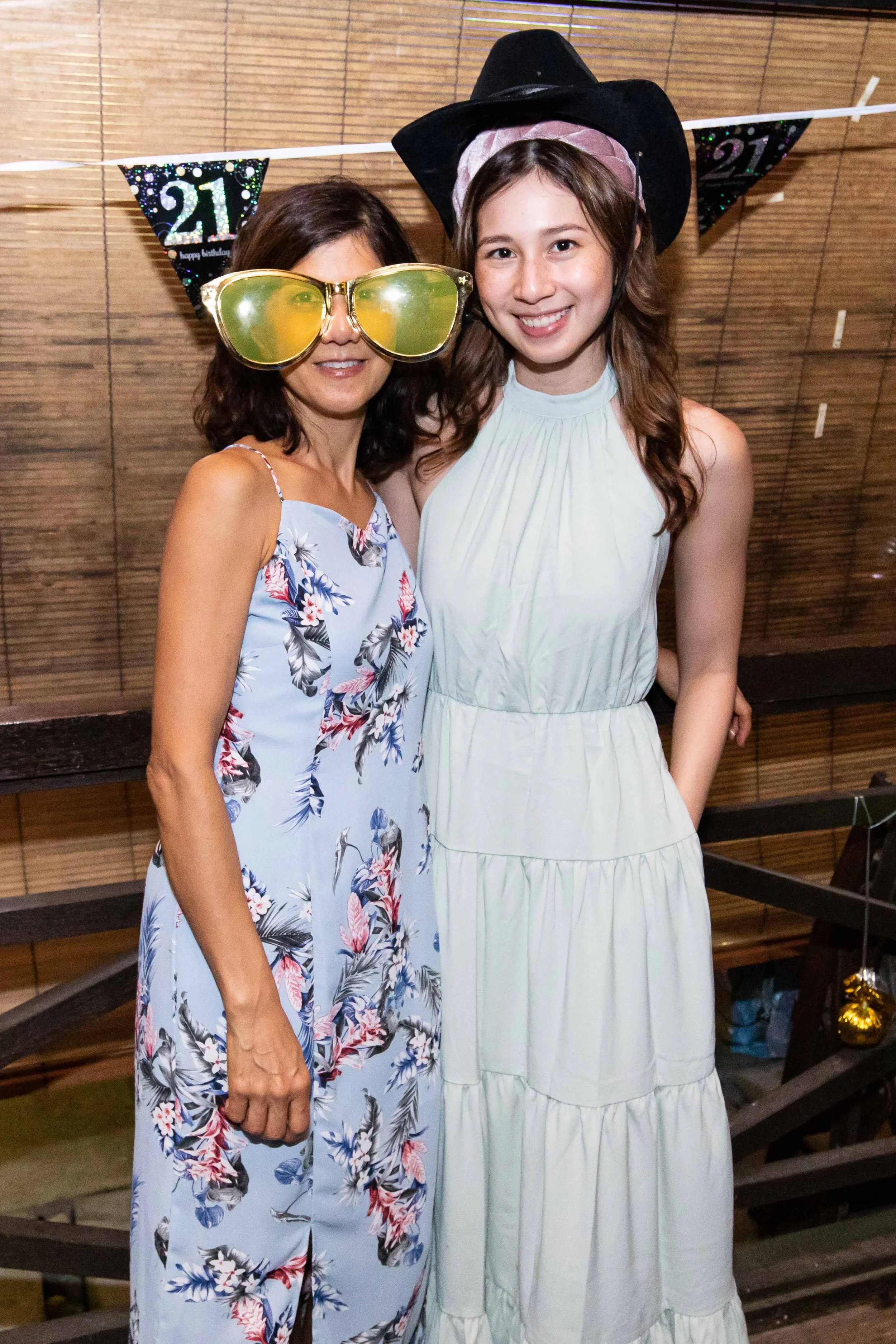 Guests celebrating Alex's 21st birthday at an East Coast beachside restaurant in Singapore