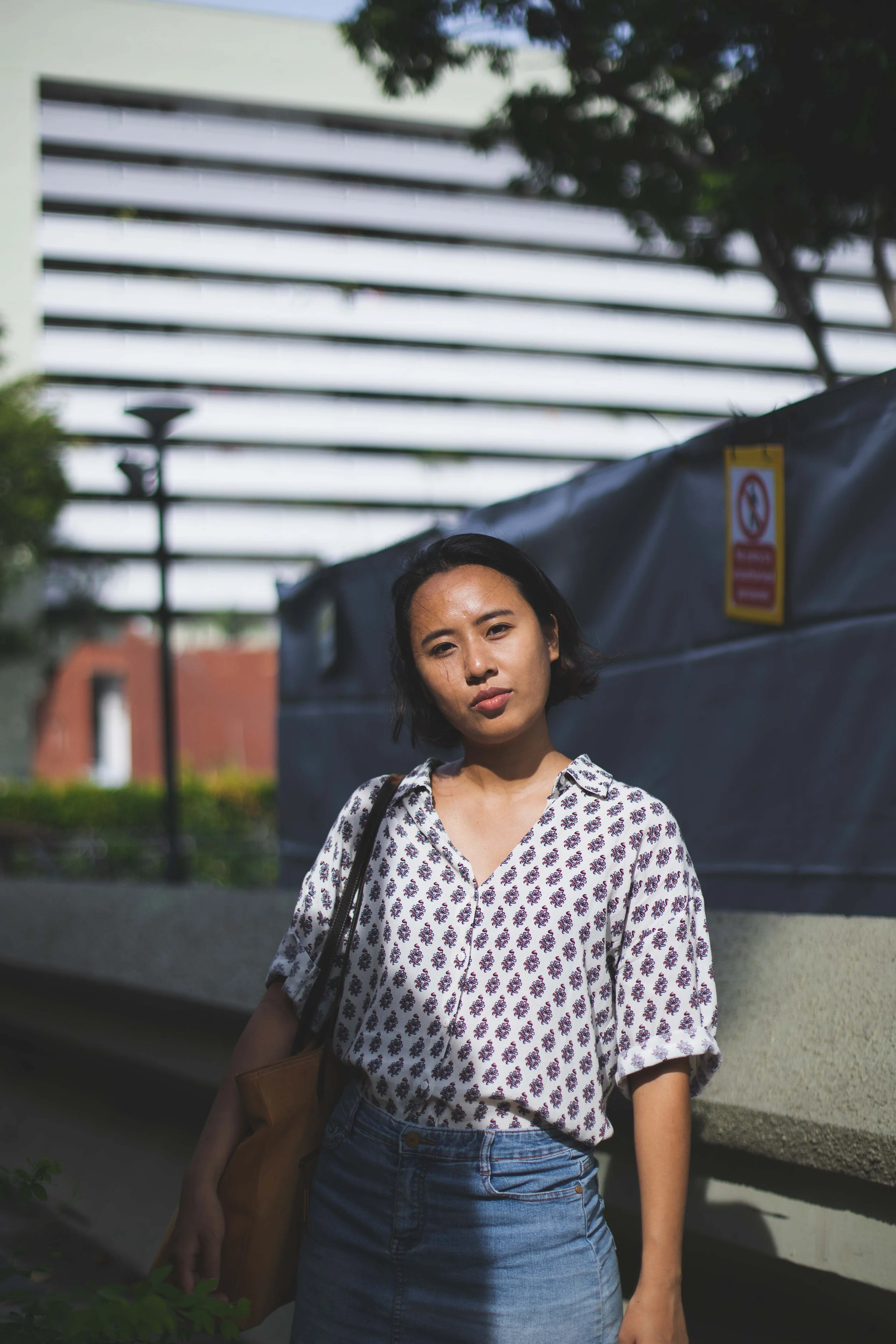 Solo model portrait of Wei Lin during an urban photoshoot in Singapore from Little India to Marina Bay at sunset