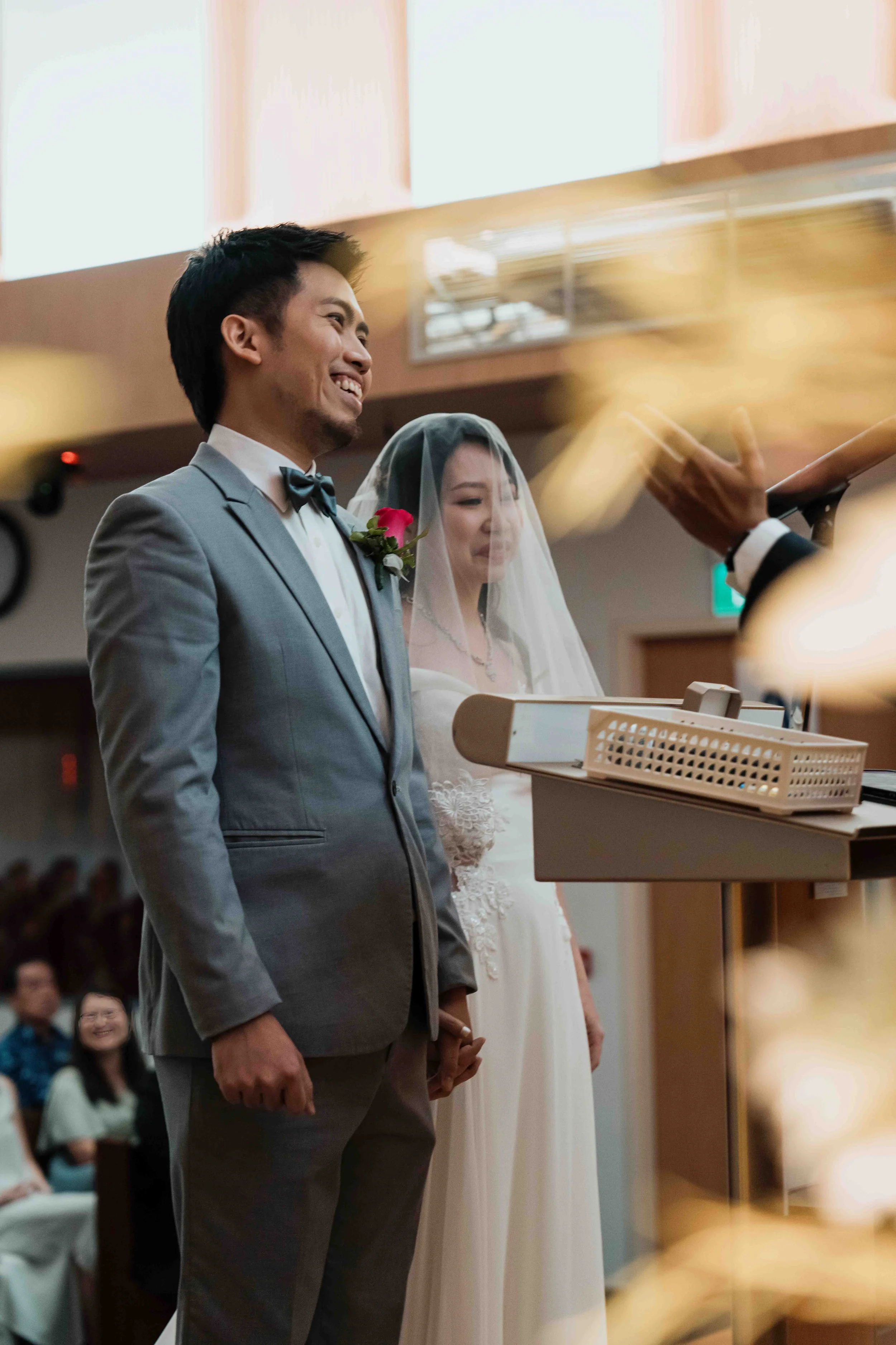 Roy and HM sharing a moment during their actual day church wedding at Bethesda Hall Ang Mo Kio