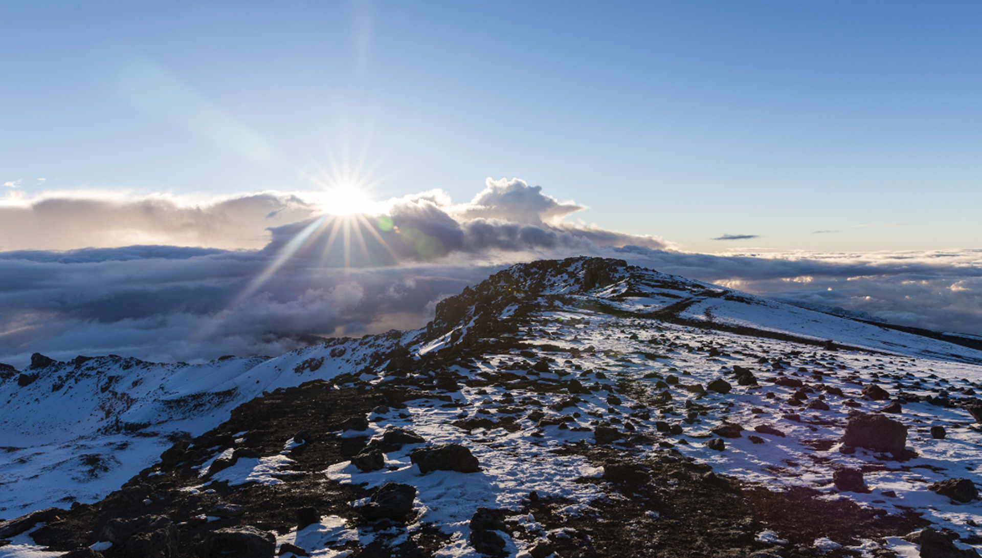Mountain camp at sunset on a Kilimanjaro trekking route