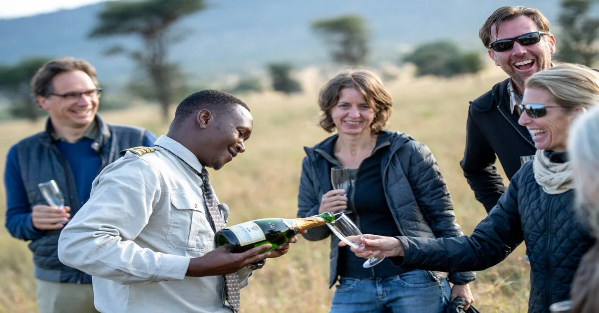 Champagne bush breakfast after a hot air balloon safari landing