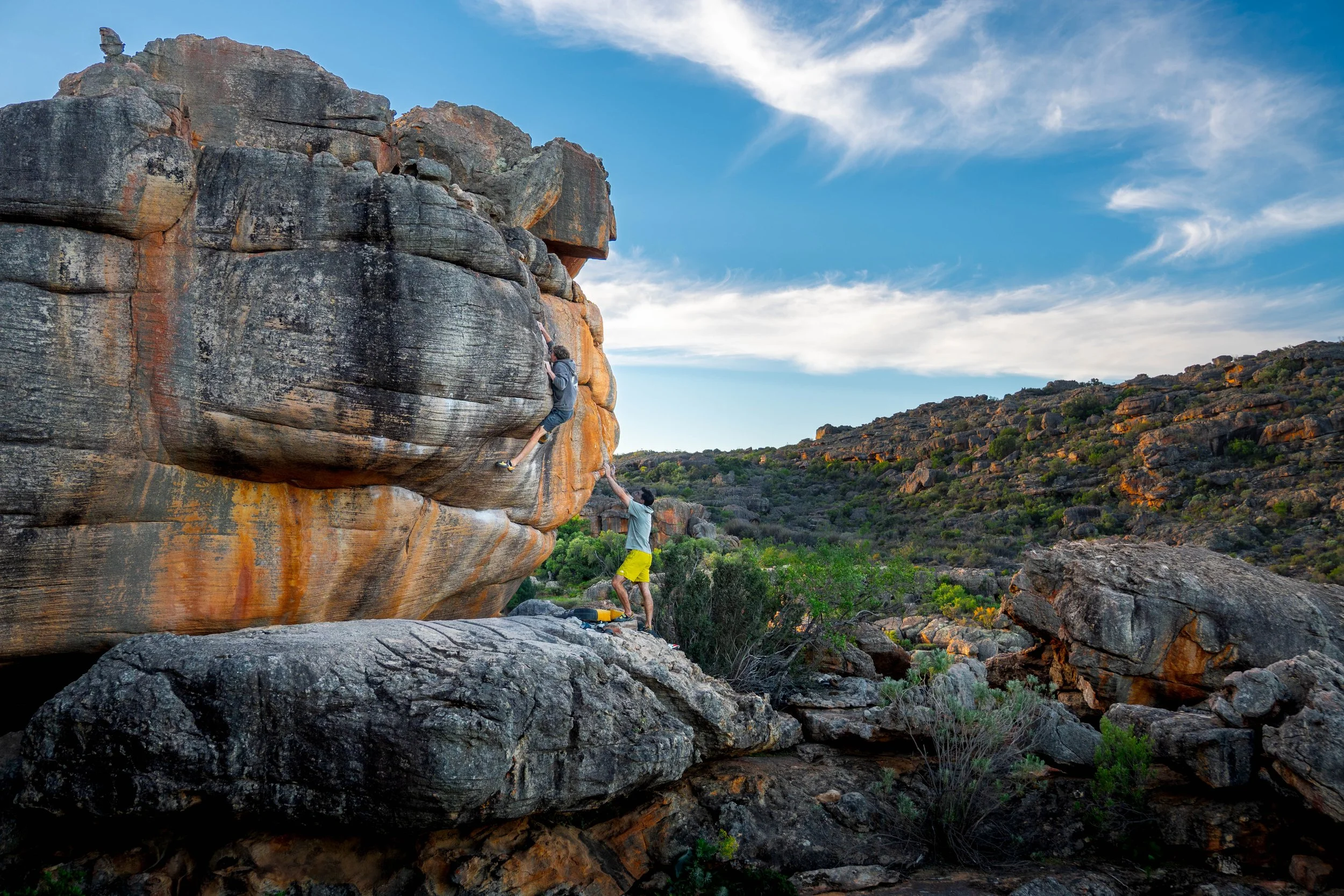 Climber on a sandstone boulder in Rocklands