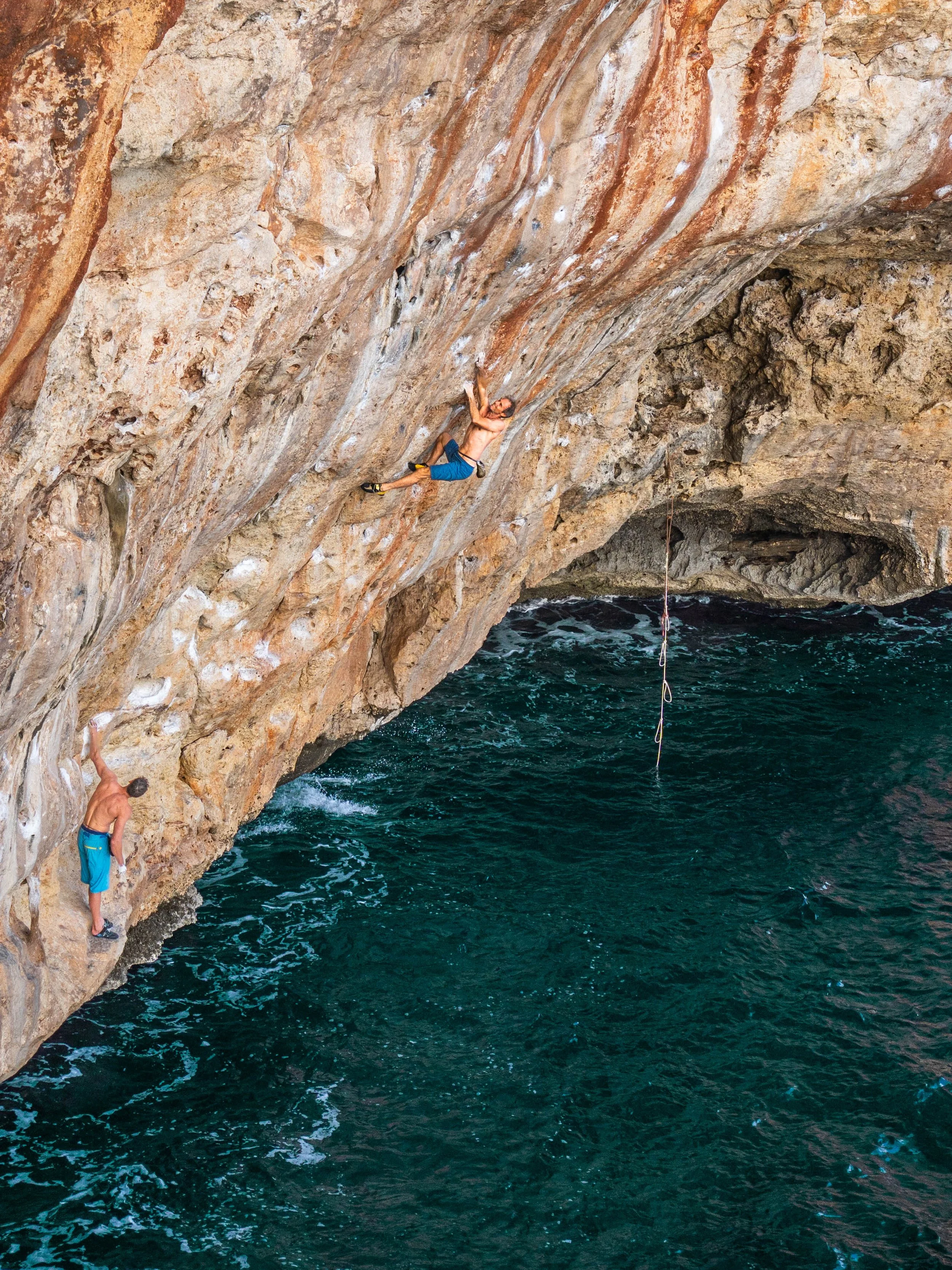 Deep water solo above the sea in Mallorca