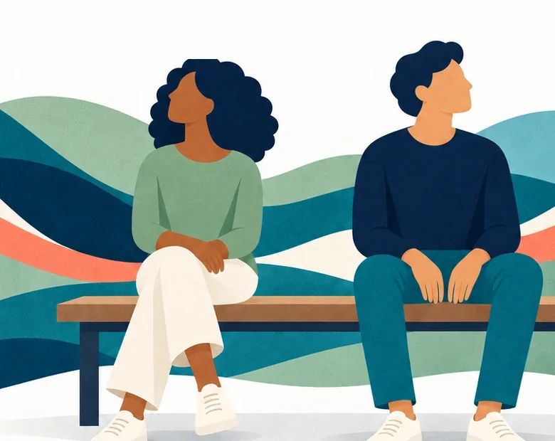 Two people sitting quietly as flowing waves move behind them.