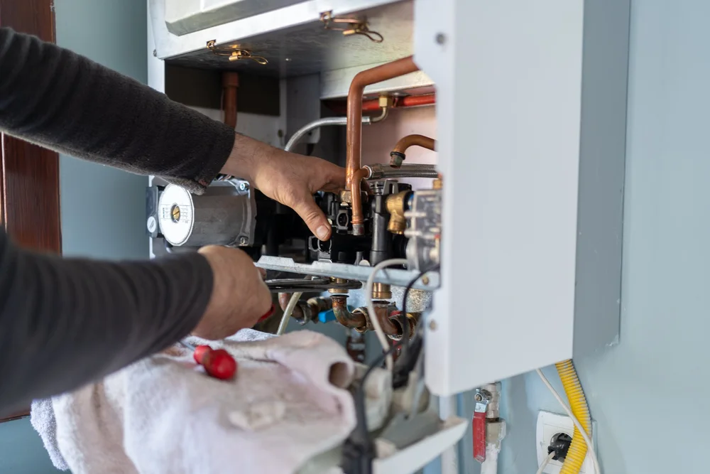 AC condenser unit blowing warm air repair Southeast Michigan