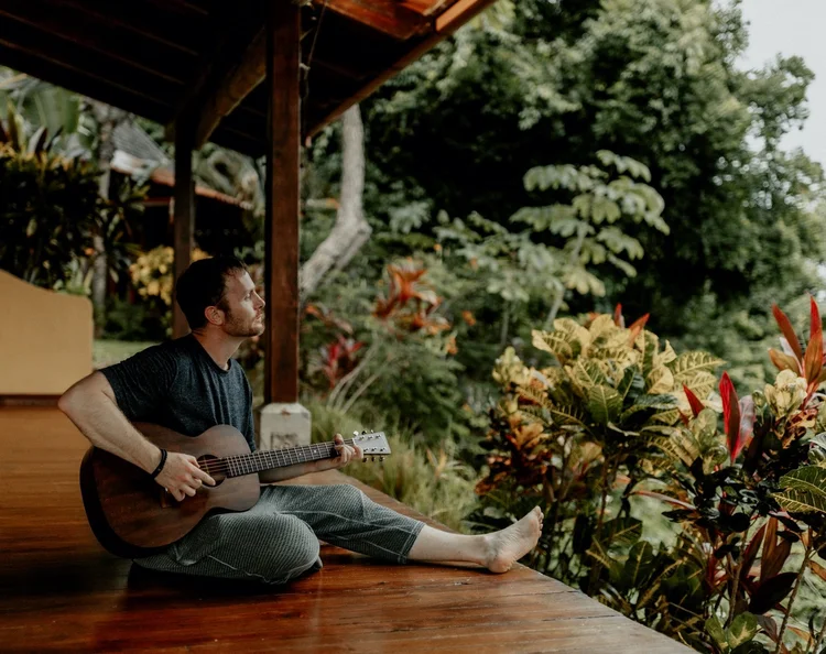 Steve playing guitar for Kirtan