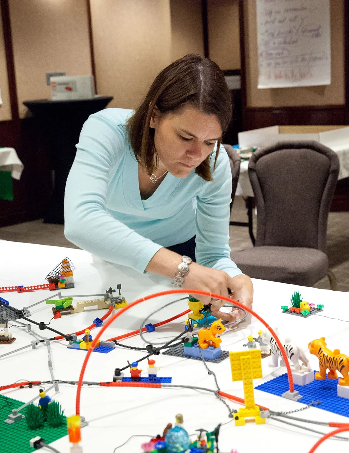 Participants using LEGO bricks during the process