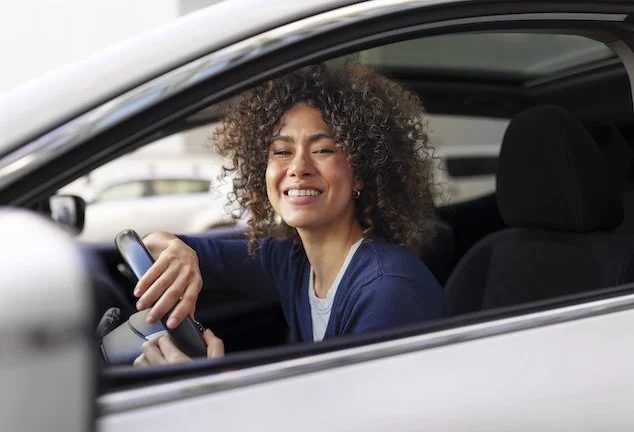 Driver preparing documents inside a vehicle