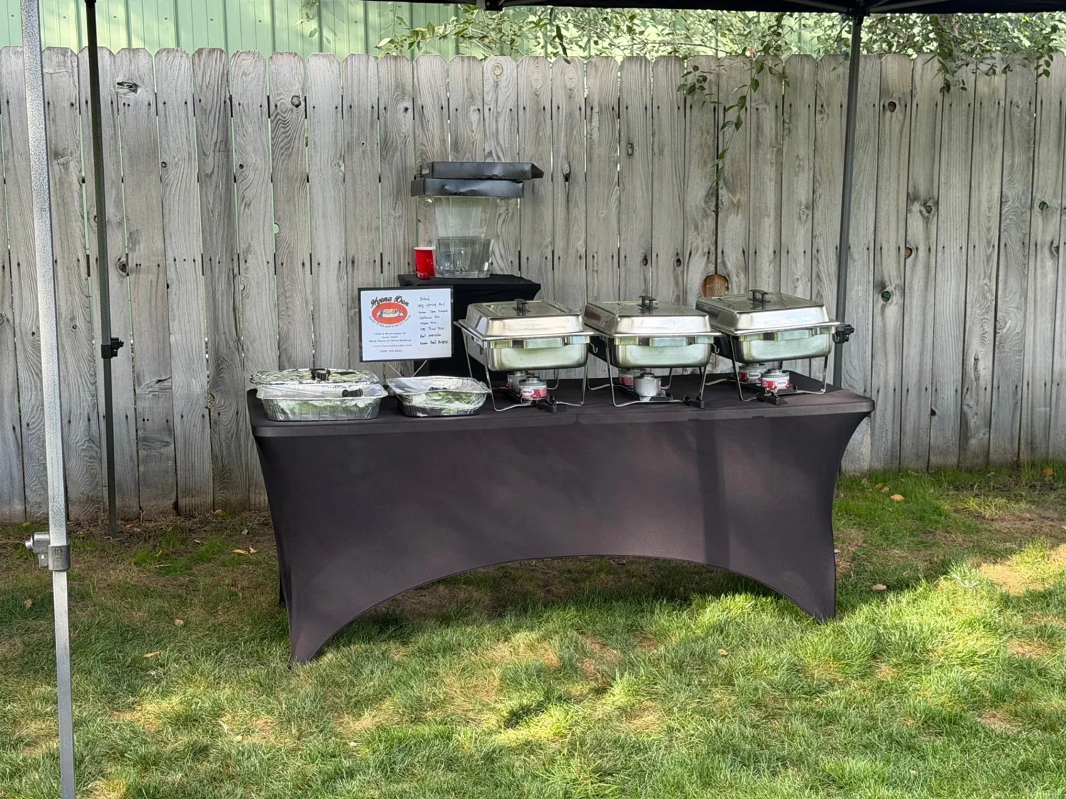 Catering buffet with covered chafing dishes