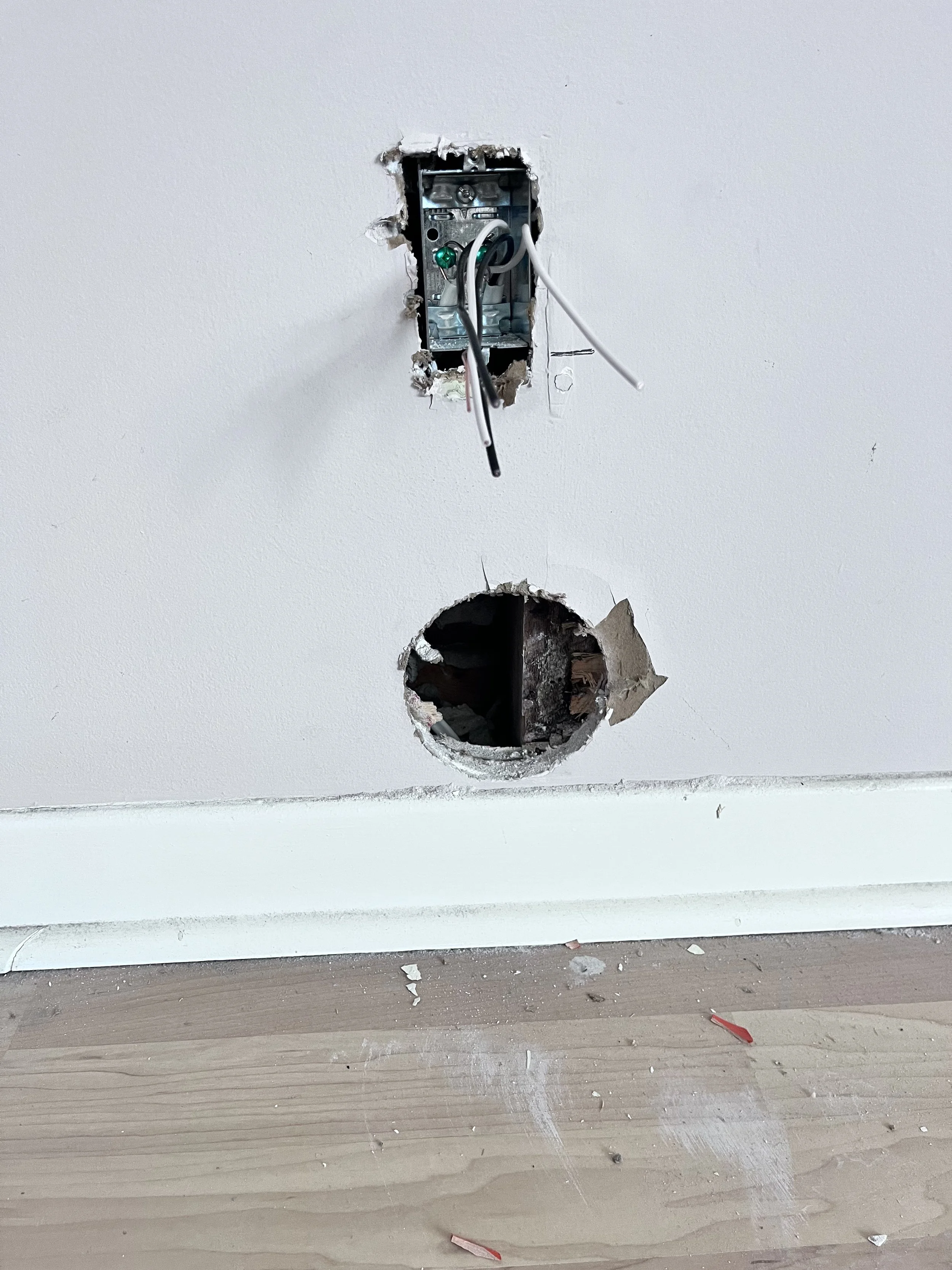 Knob and tube wiring in Little Italy home framing