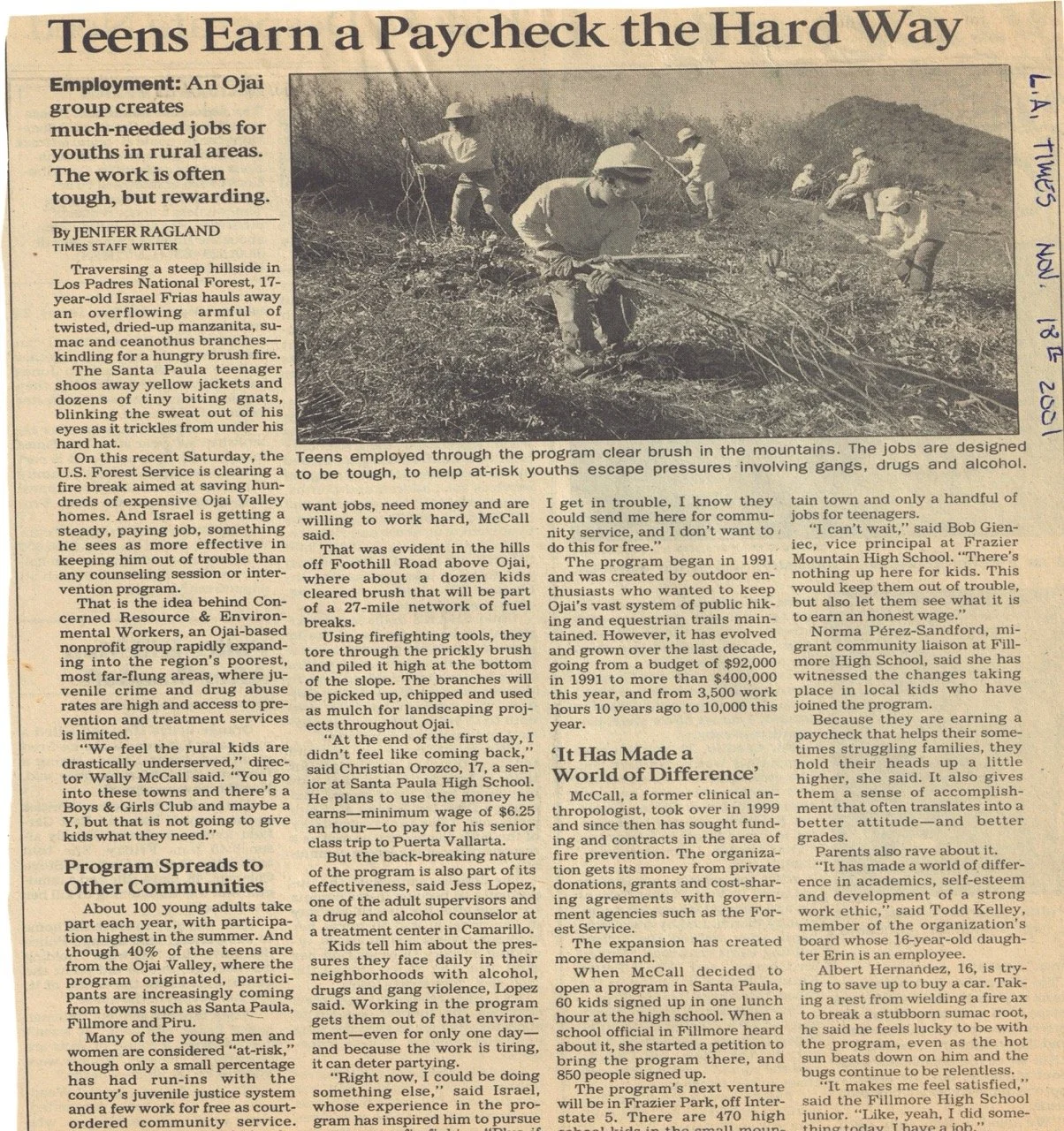 Los Angeles Times clipping, November 18, 2001: C.R.E.W. crew members clearing brush on a hillside