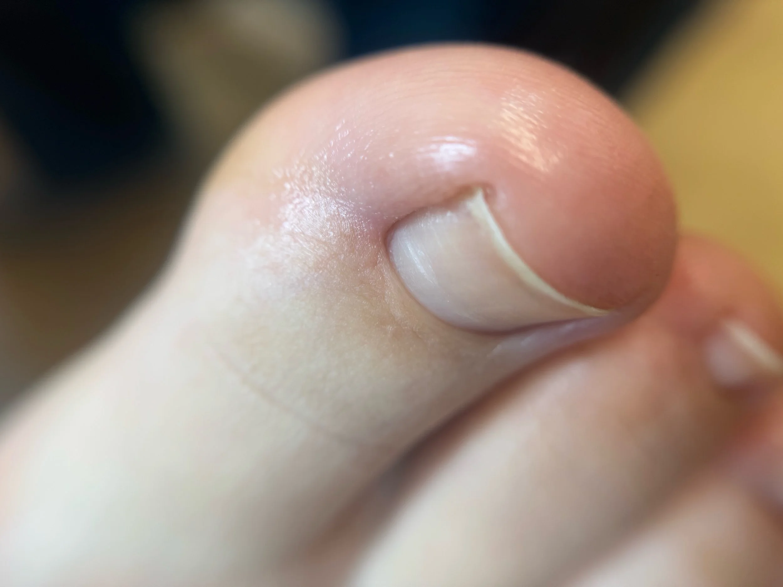 Final result after Jennifer's advanced dry pedicure training, close-up of polished toe detail