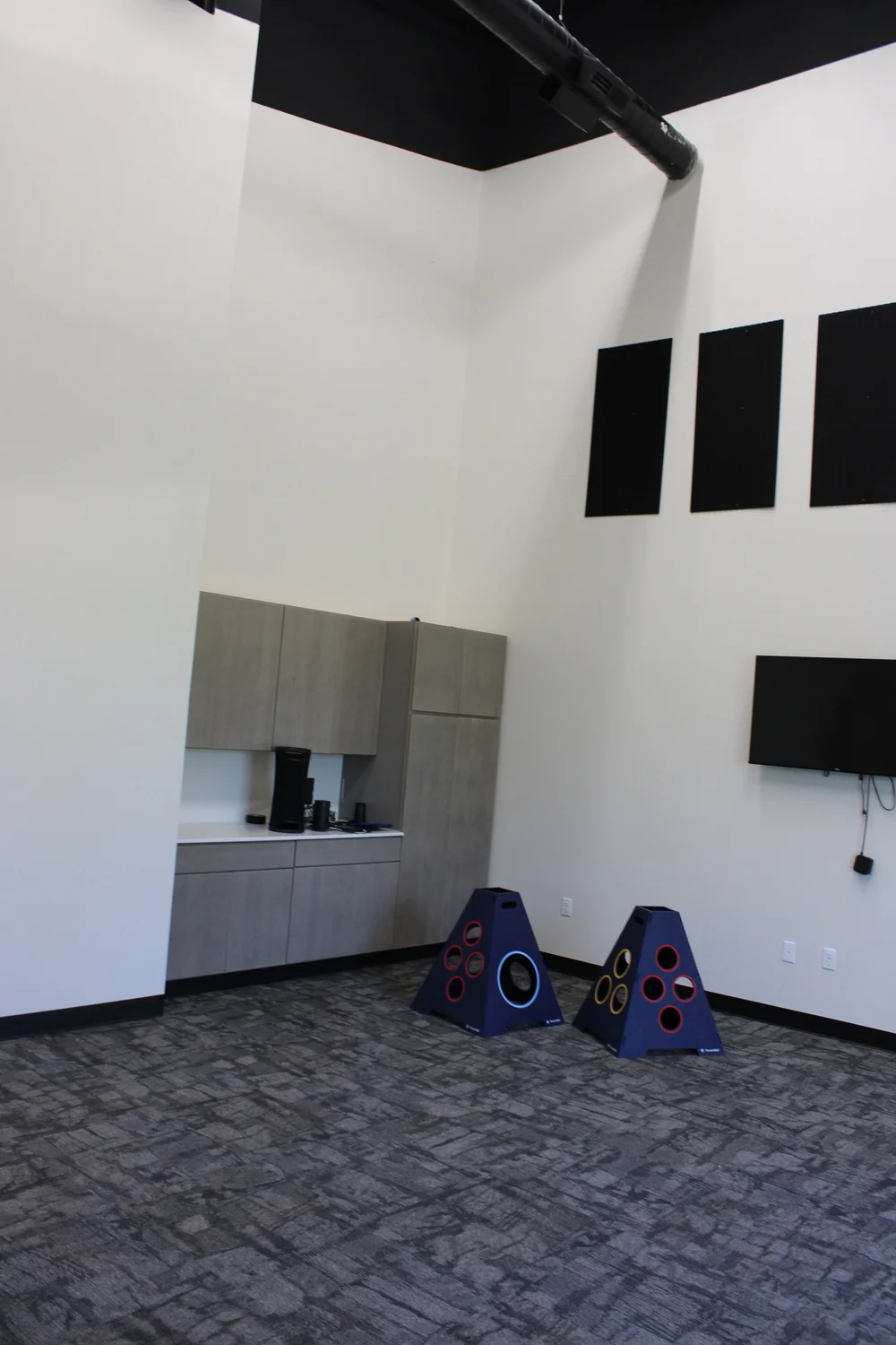 Interior room at an Ankeny church with light walls and dark overhead finishes